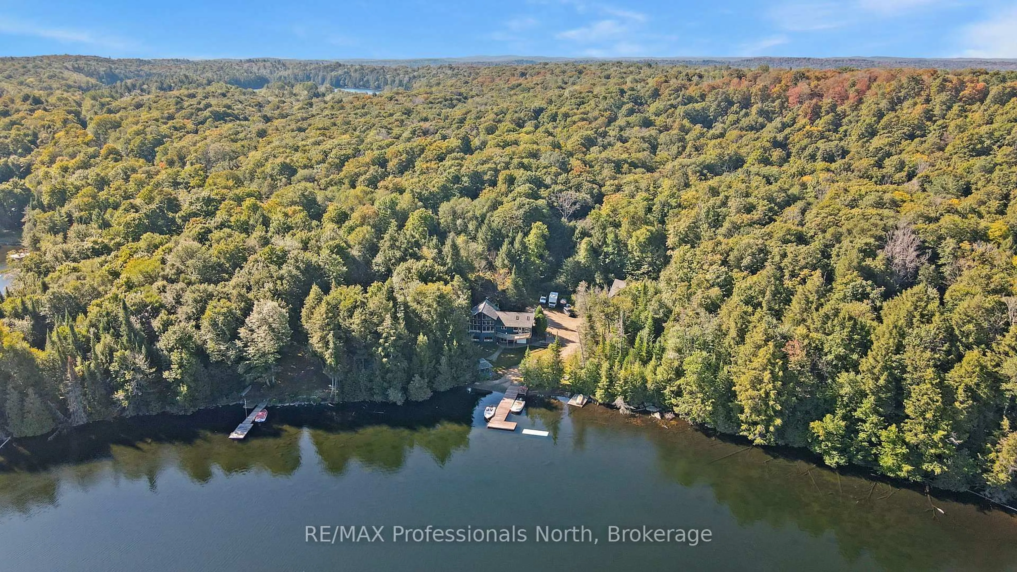A pic from outside/outdoor area/front of a property/back of a property/a pic from drone, water/lake/river/ocean view for 1645 Allen Lake Dr, Dysart et al Ontario K0L 1X0