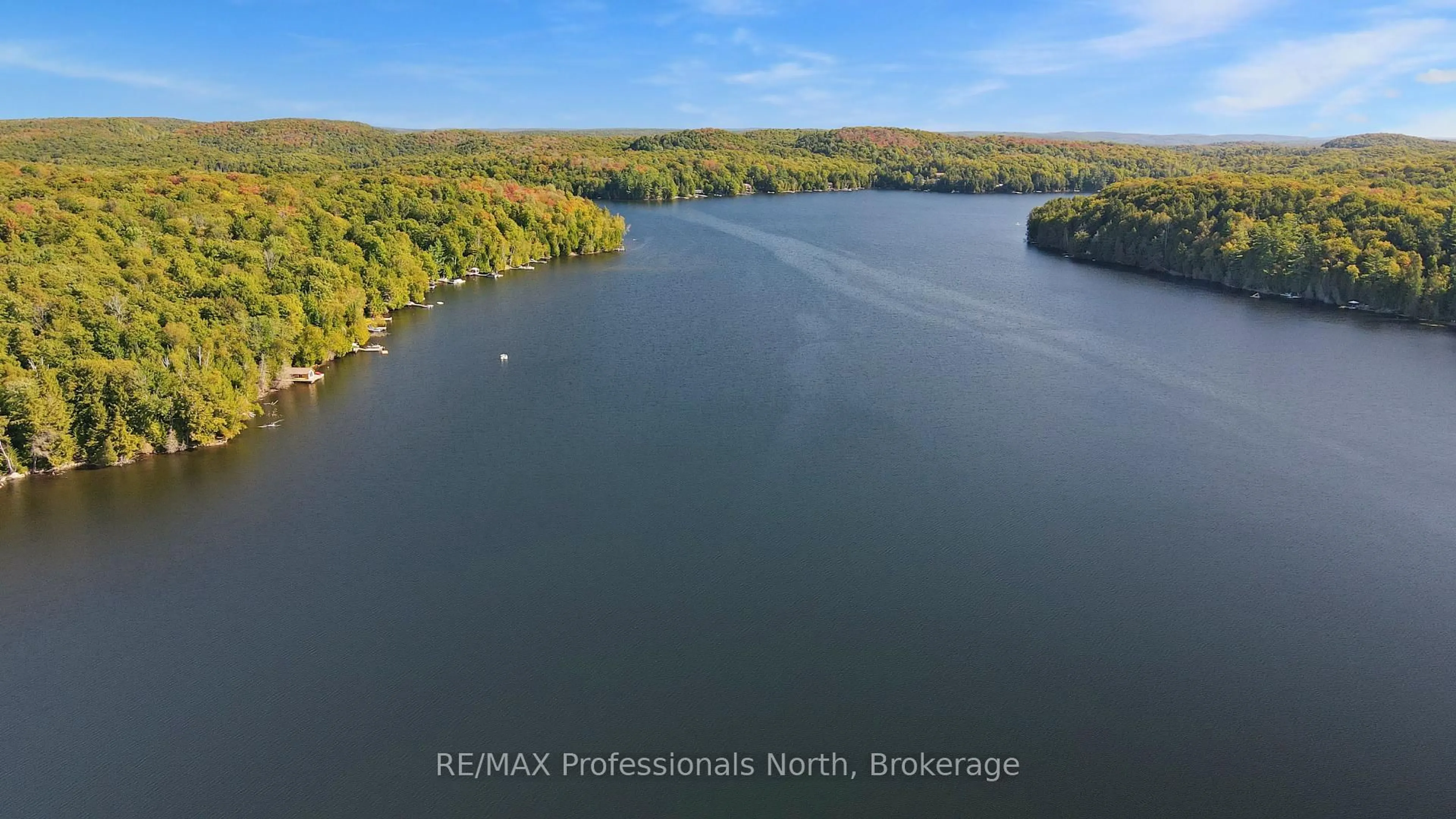 A pic from outside/outdoor area/front of a property/back of a property/a pic from drone, water/lake/river/ocean view for 1645 Allen Lake Dr, Dysart et al Ontario K0L 1X0
