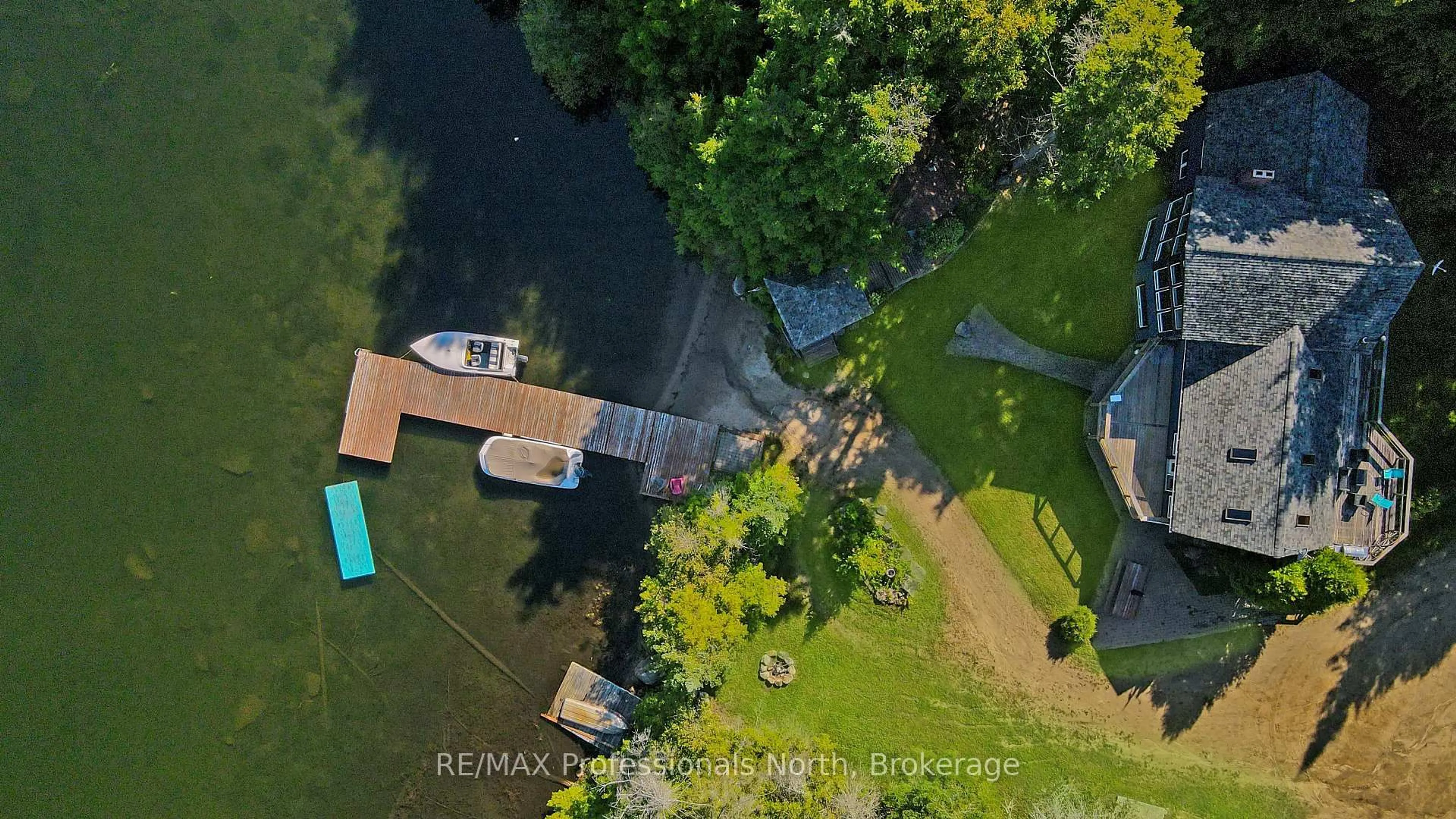 A pic from outside/outdoor area/front of a property/back of a property/a pic from drone, water/lake/river/ocean view for 1645 Allen Lake Dr, Dysart et al Ontario K0L 1X0