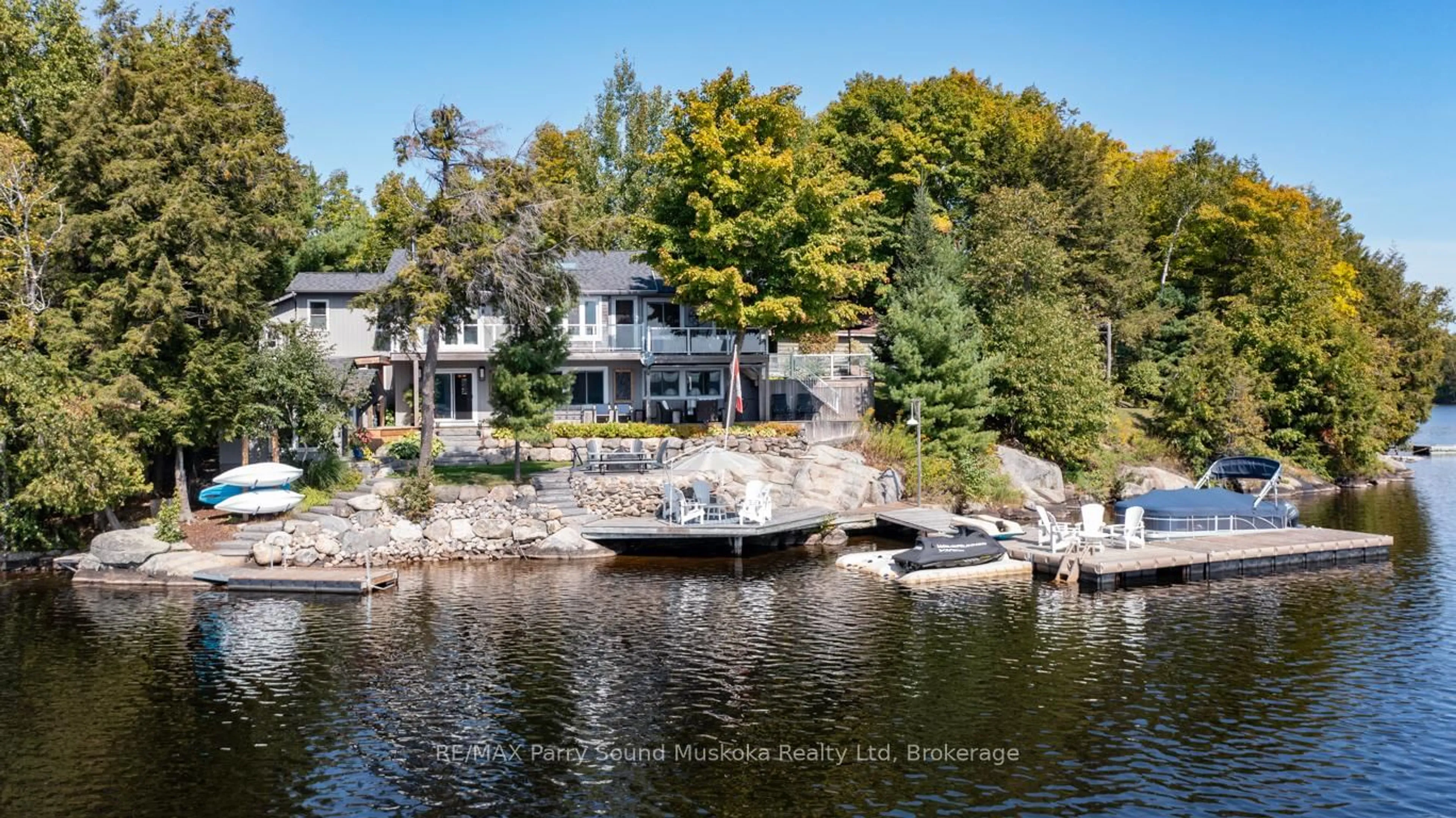 A pic from outside/outdoor area/front of a property/back of a property/a pic from drone, water/lake/river/ocean view for 51 Deerfield Rd, McKellar Ontario P2A 0B4
