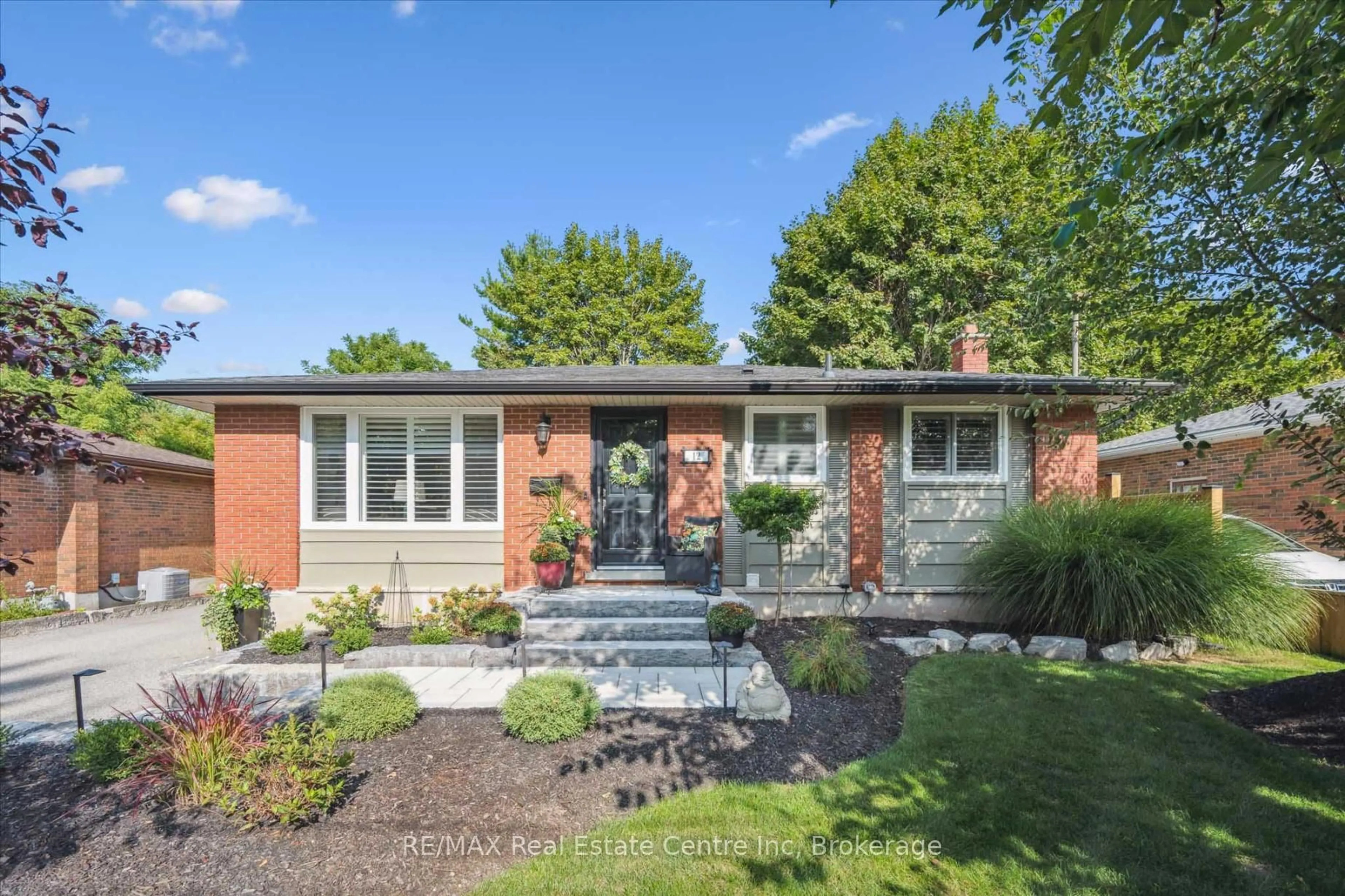 Home with brick exterior material, street for 12 Carter Dr, Guelph Ontario N1E 1X7