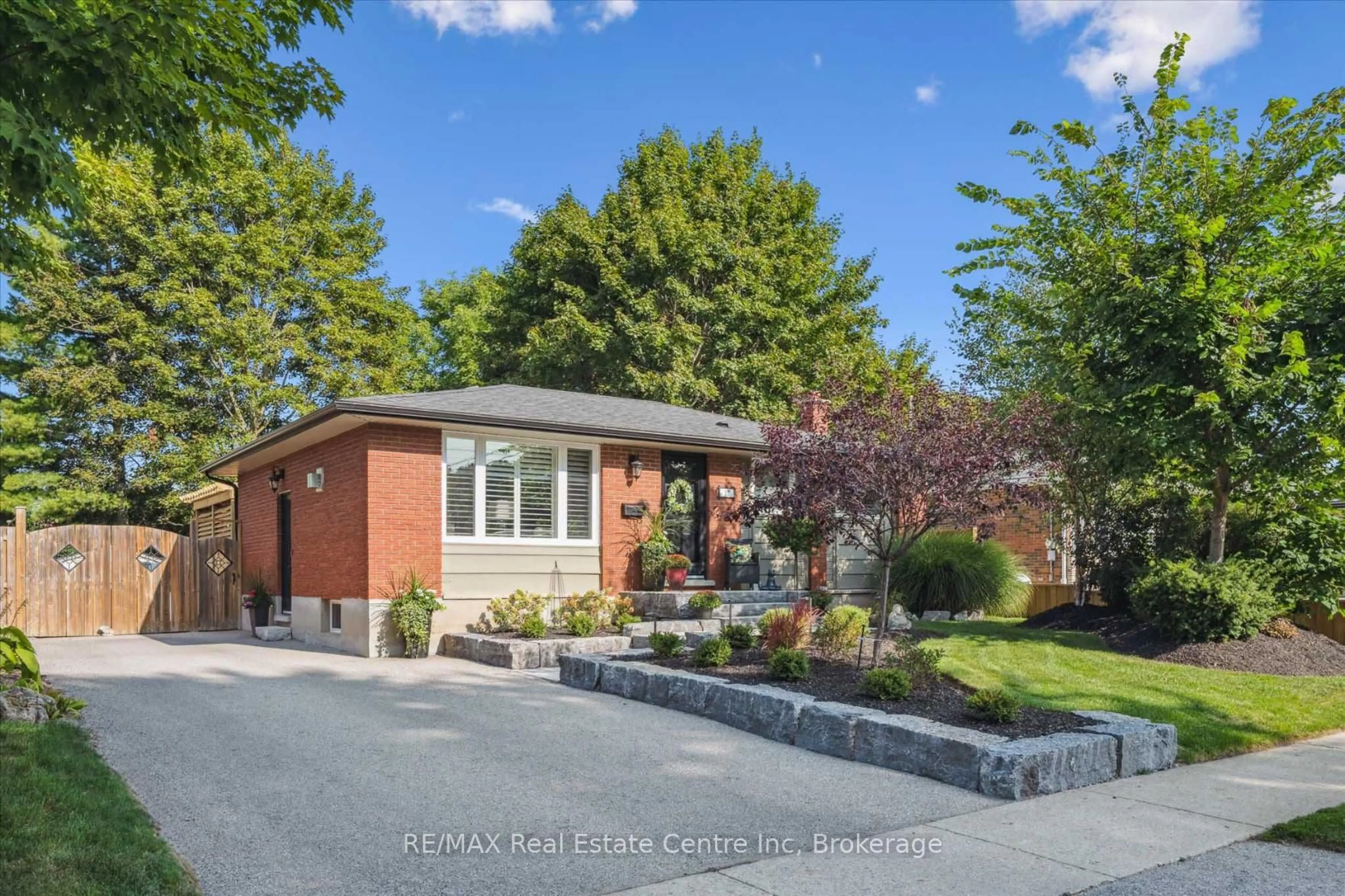 Home with brick exterior material, street for 12 Carter Dr, Guelph Ontario N1E 1X7