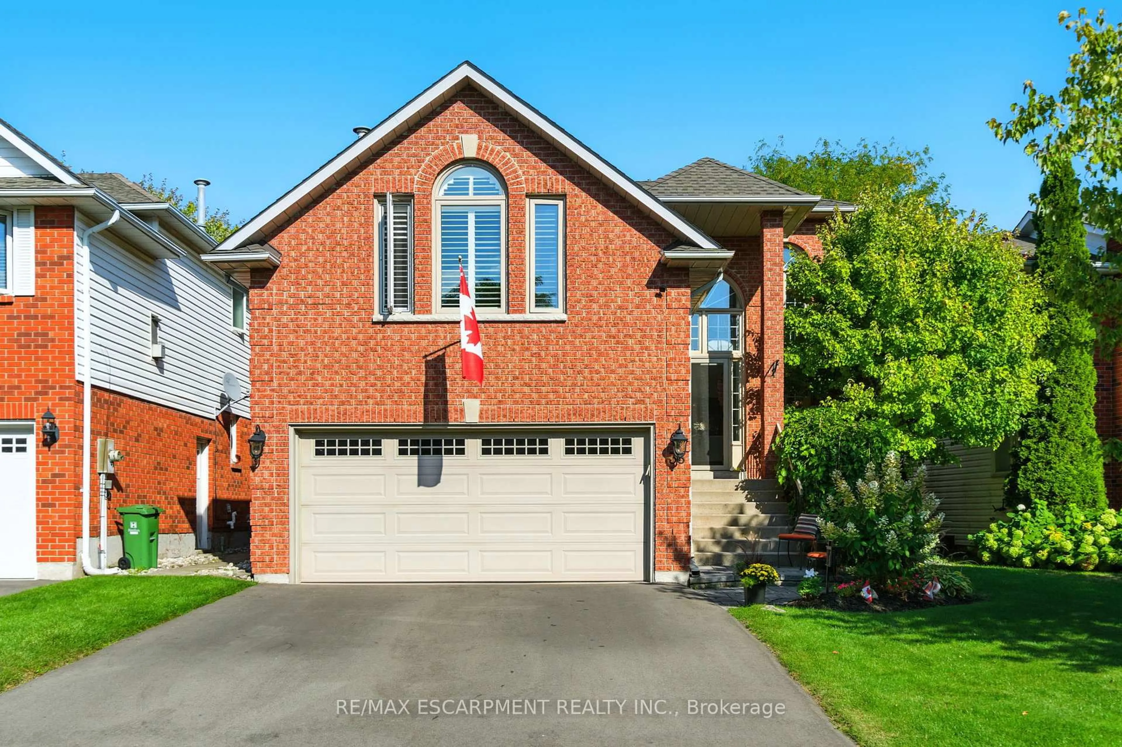 Home with brick exterior material, street for 36 Pinecreek Rd, Hamilton Ontario L0R 2H5