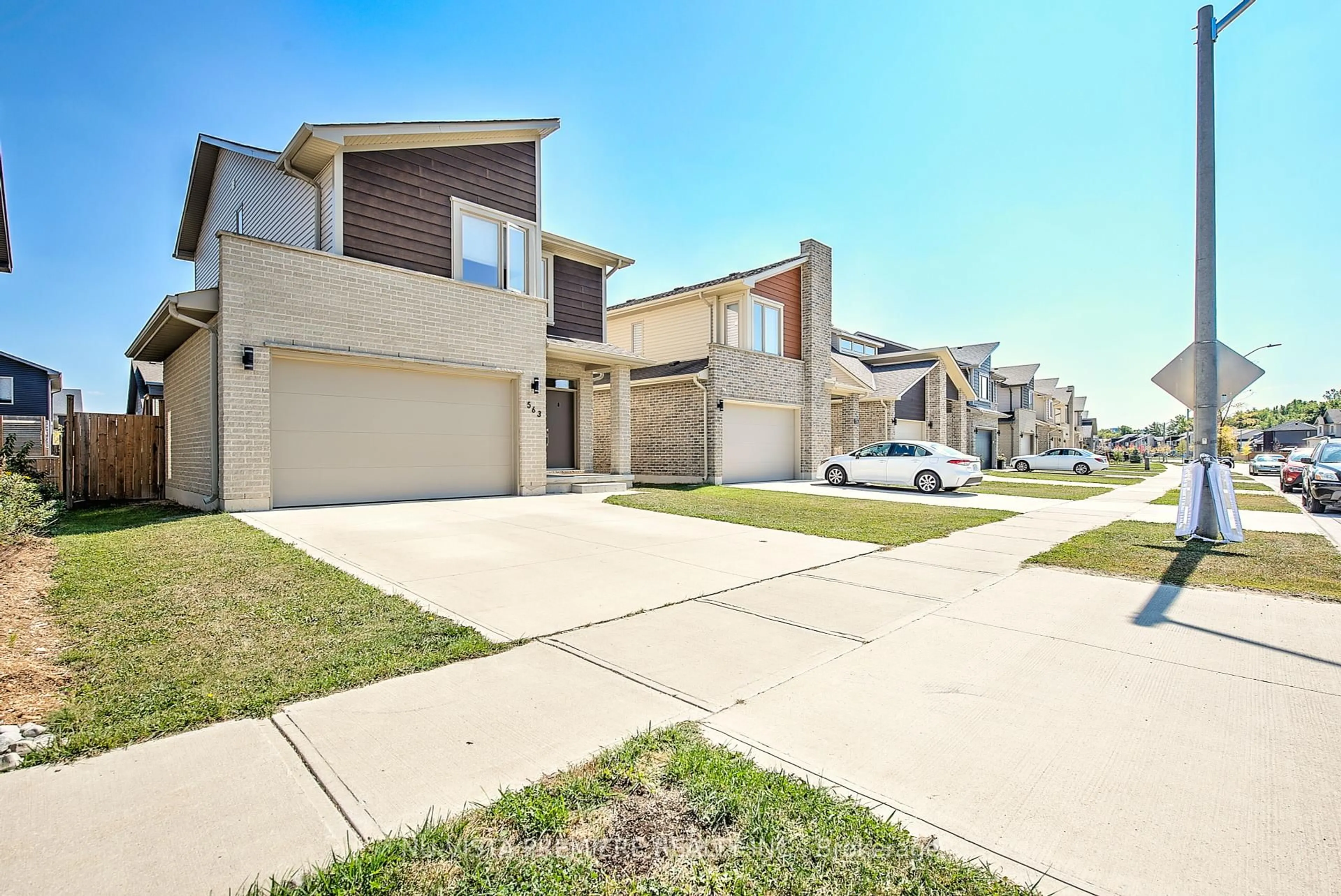 A pic from outside/outdoor area/front of a property/back of a property/a pic from drone, street for 563 Chelton Rd, London South Ontario N6M 0H8
