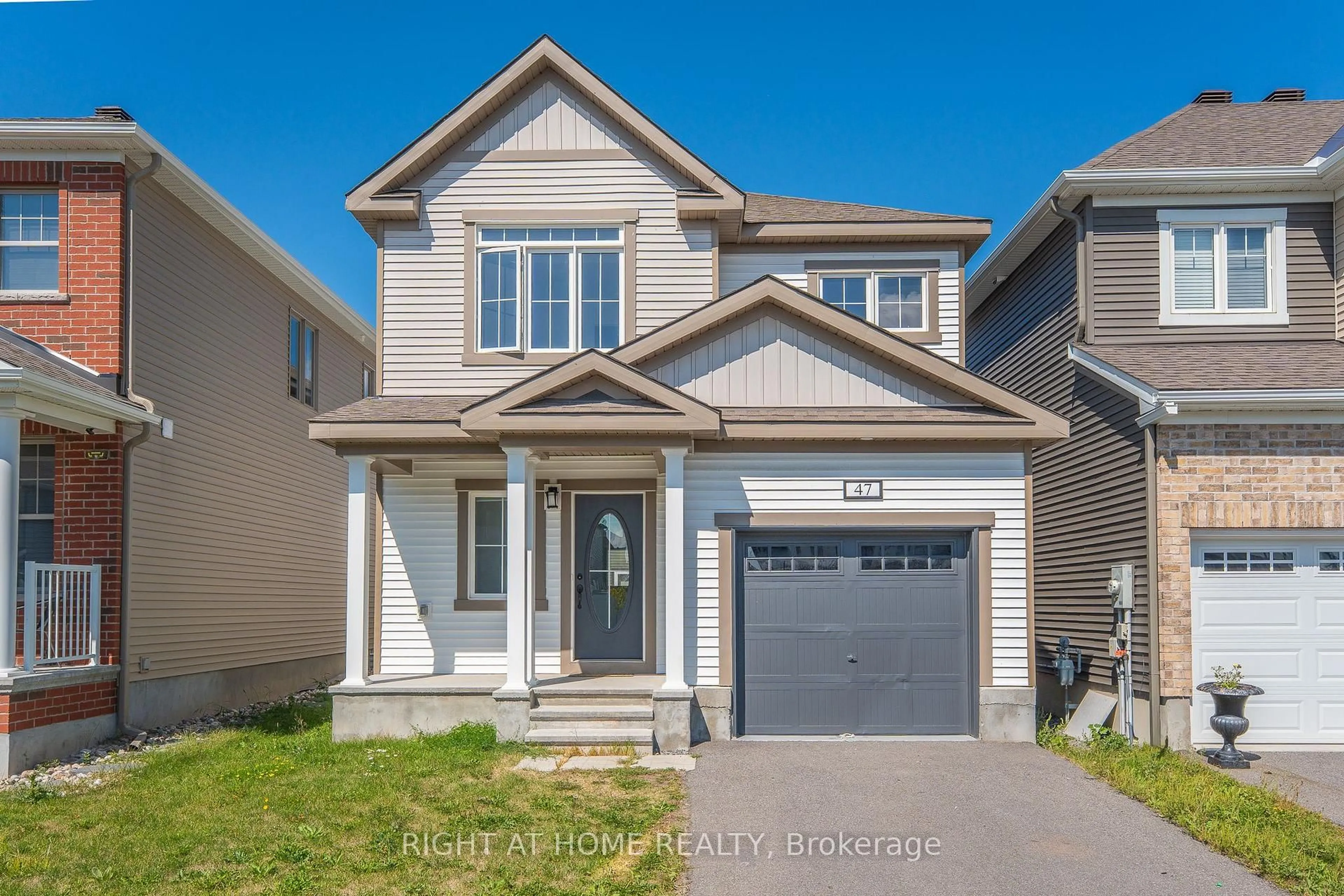 Home with vinyl exterior material, street for 47 Mudminnow Cres, Orleans Ontario K4A 5H9