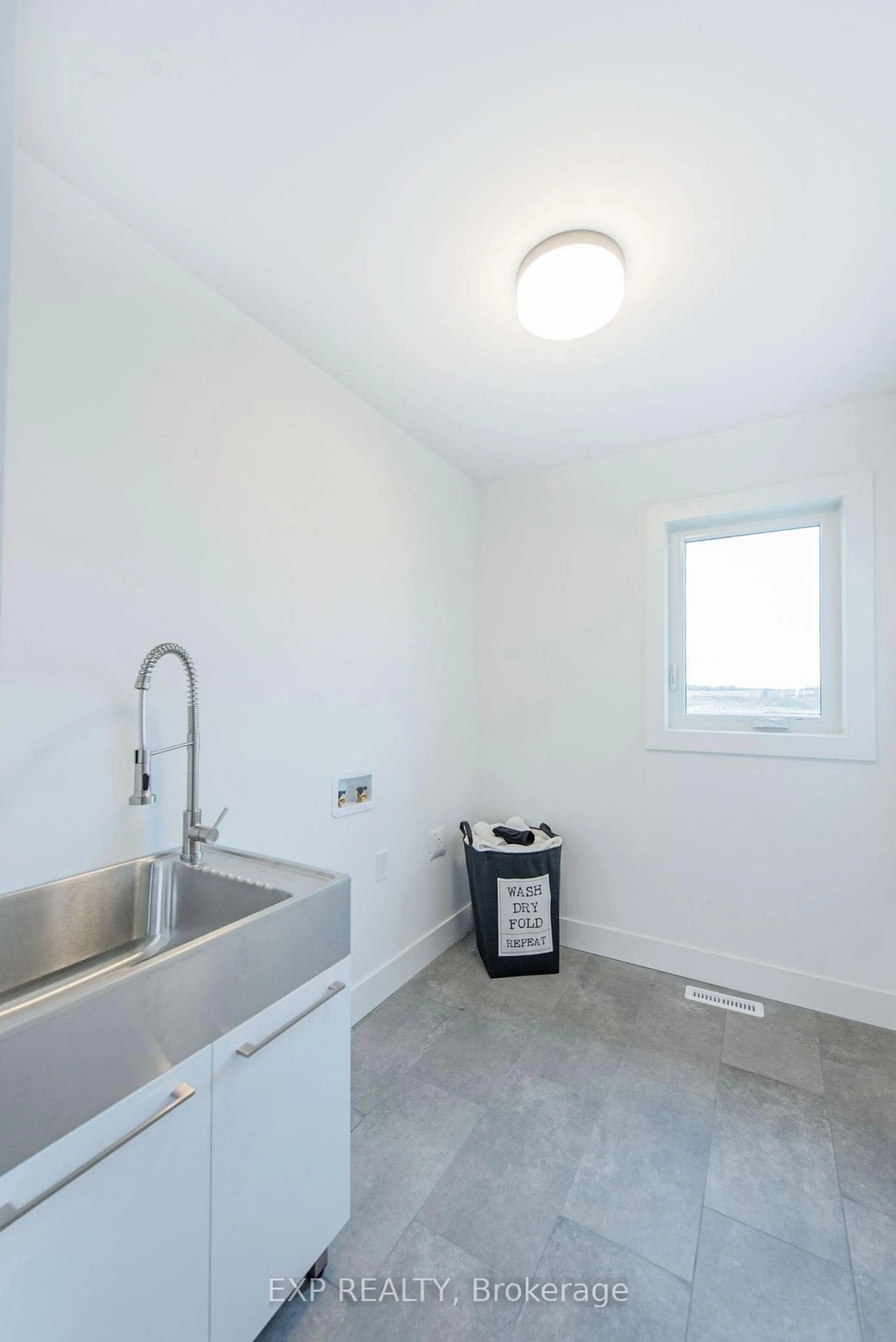 Laundry room for 205 Merritt Crt, North Middlesex Ontario N0M 2K0