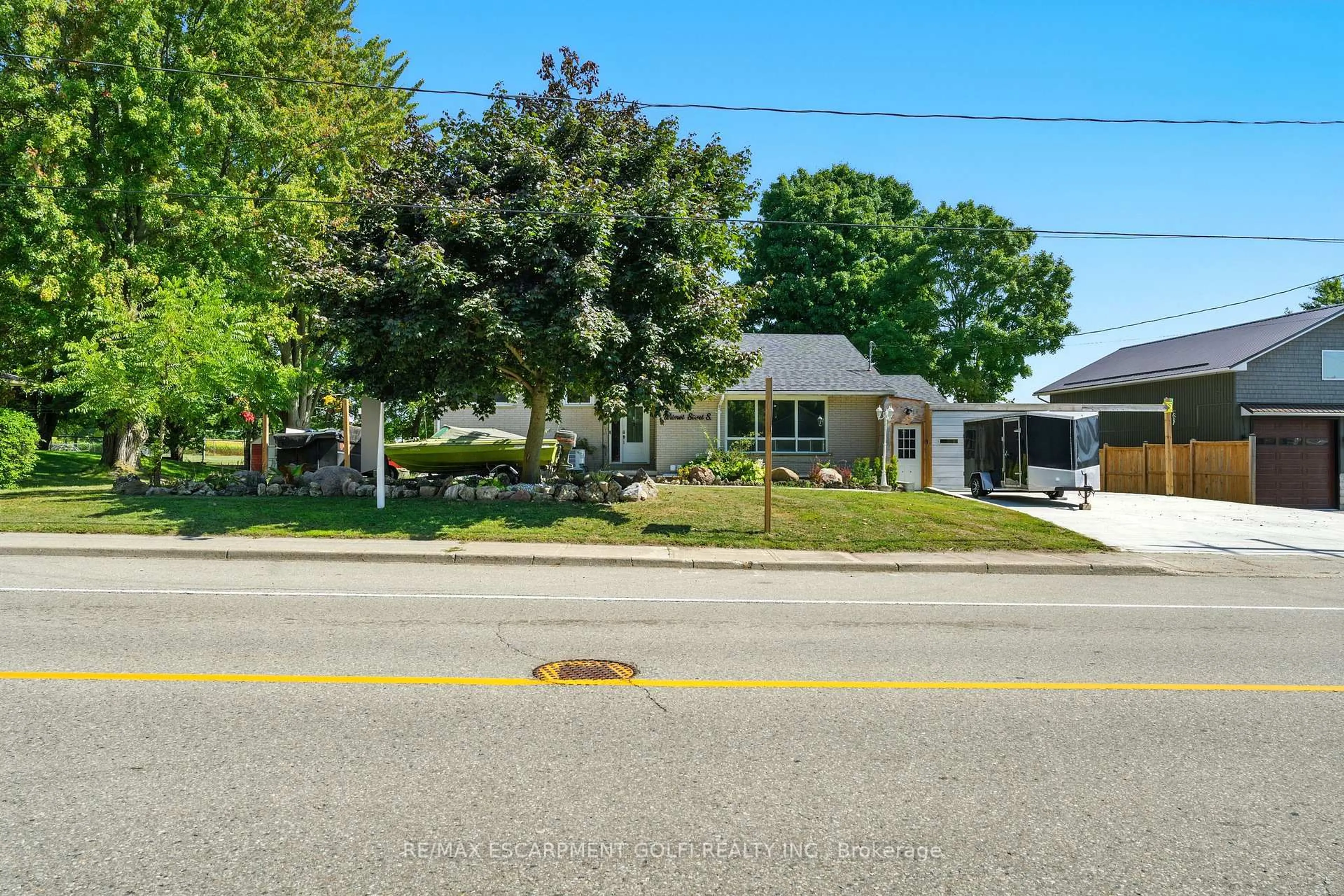 A pic from outside/outdoor area/front of a property/back of a property/a pic from drone, street for 64 WILMOT St, Blandford-Blenheim Ontario N0J 1G0
