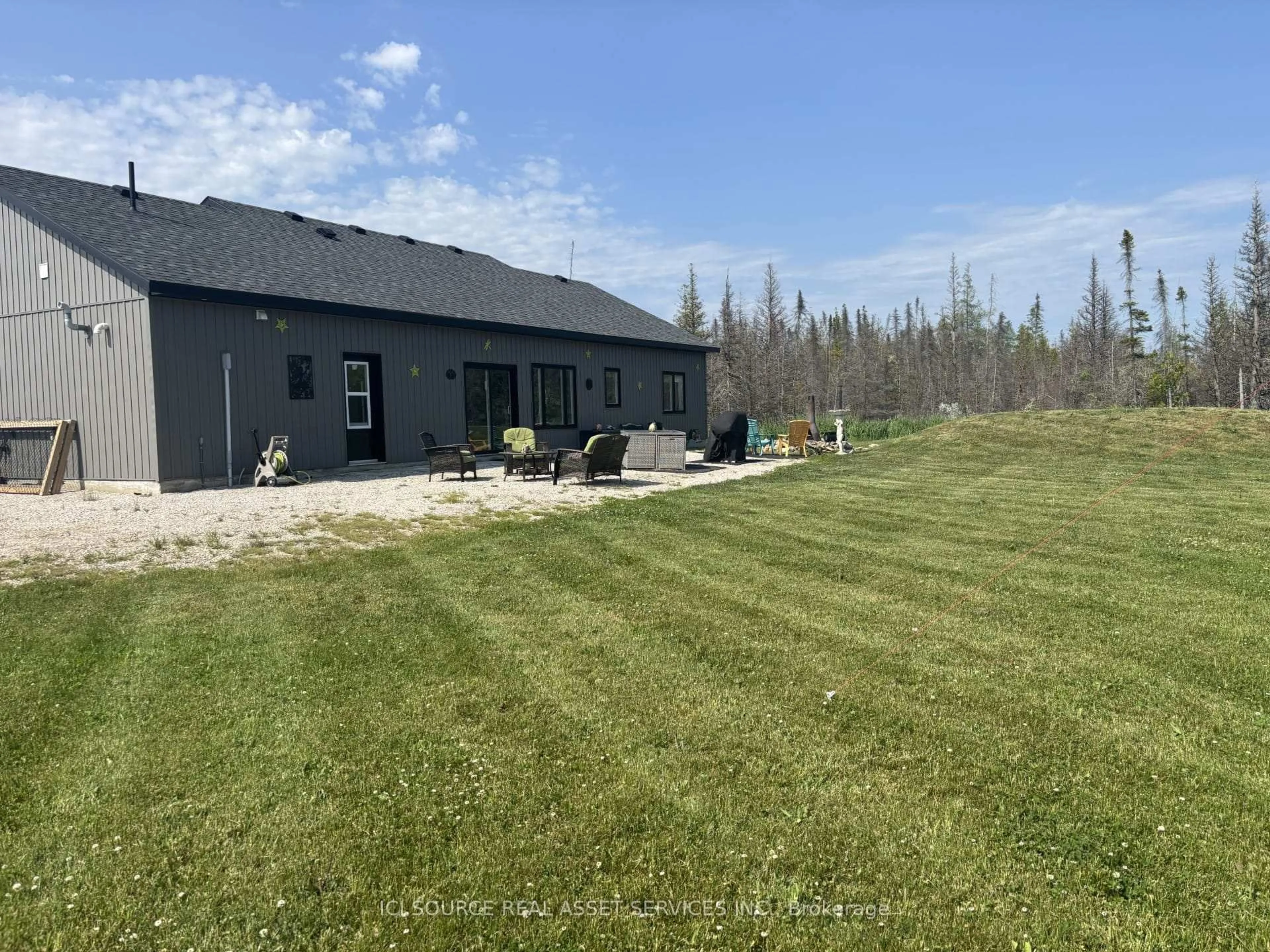 A pic from outside/outdoor area/front of a property/back of a property/a pic from drone, unknown for 621 Lindsay Road 30, Northern Bruce Peninsula Ontario N0H 1Z0