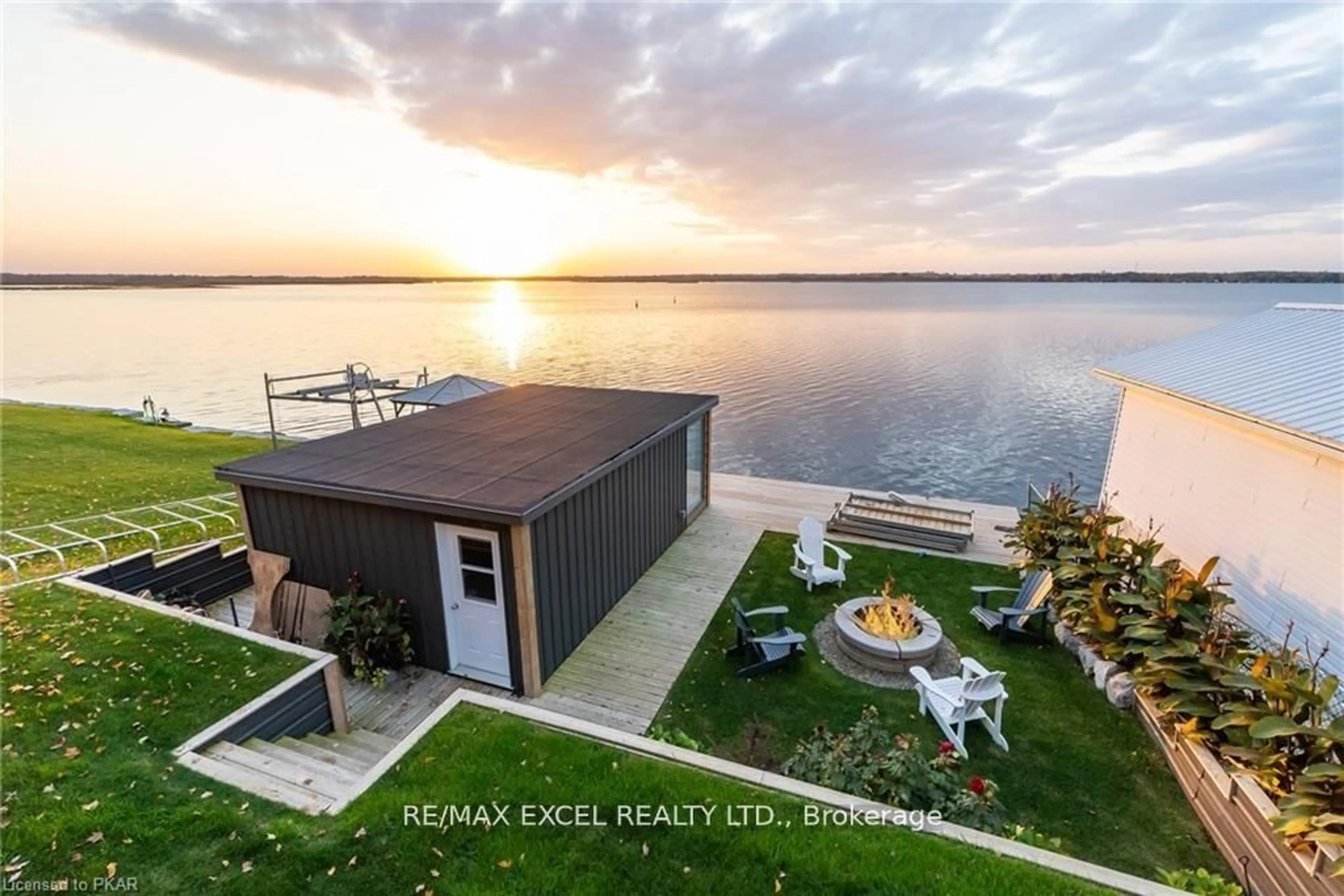 A pic from outside/outdoor area/front of a property/back of a property/a pic from drone, water/lake/river/ocean view for 205 Snug Harbour Rd, Kawartha Lakes Ontario K9V 4R6