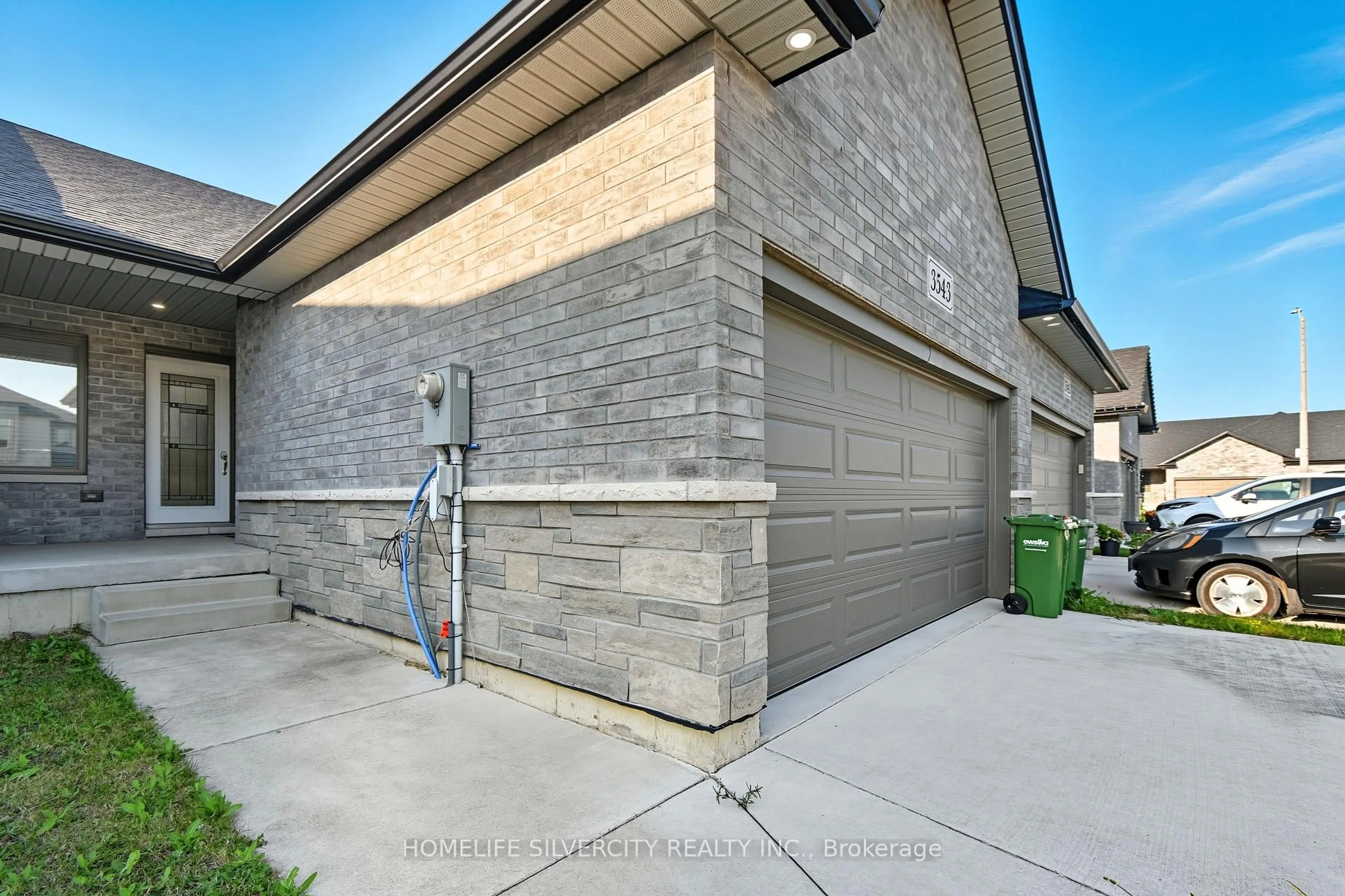 Home with brick exterior material, street for 3543 Hallee Cres, Windsor Ontario N8W 0B2