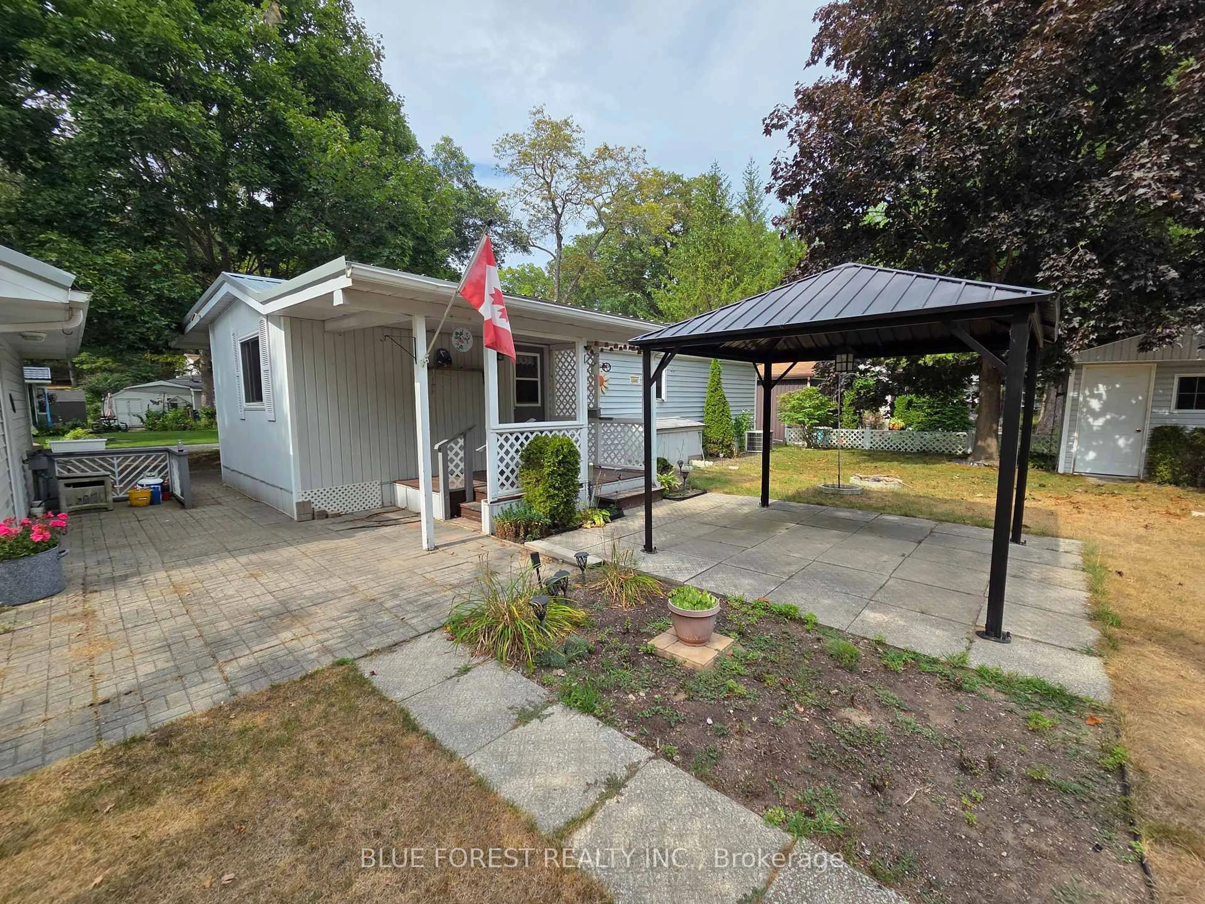 A pic from outside/outdoor area/front of a property/back of a property/a pic from drone, street for 9910 Northville Cres #B19, Lambton Shores Ontario N0M 2N0