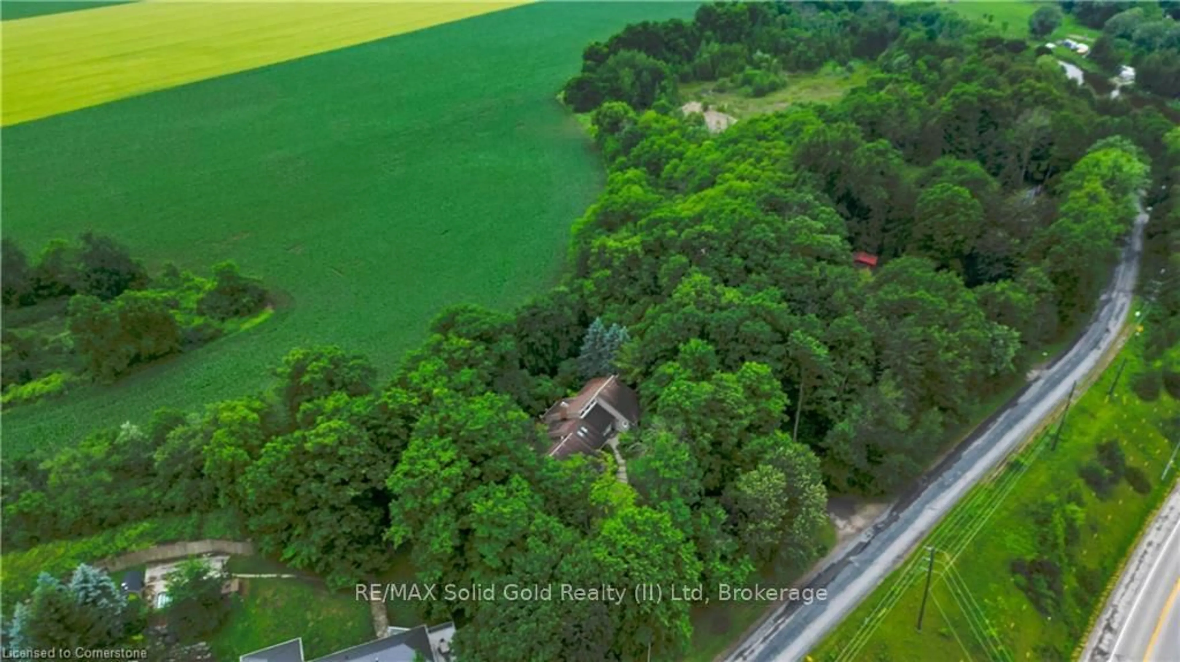 A pic from outside/outdoor area/front of a property/back of a property/a pic from drone, forest/trees view for 1020 Rivers Edge Dr, Woolwich Ontario N0B 2V0