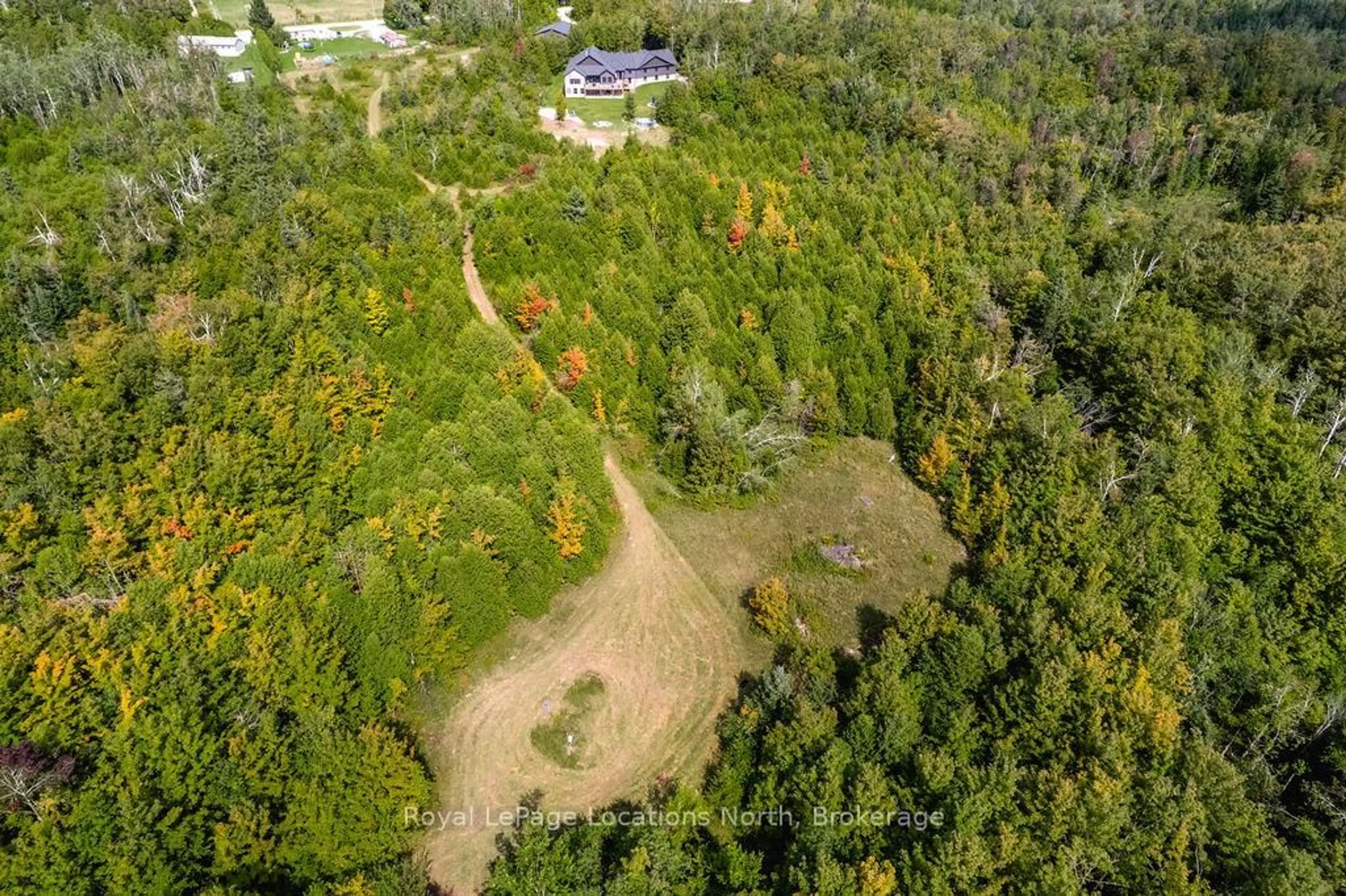 A pic from outside/outdoor area/front of a property/back of a property/a pic from drone, forest/trees view for 429540 8th B Concession, Grey Highlands Ontario N0C 1M0
