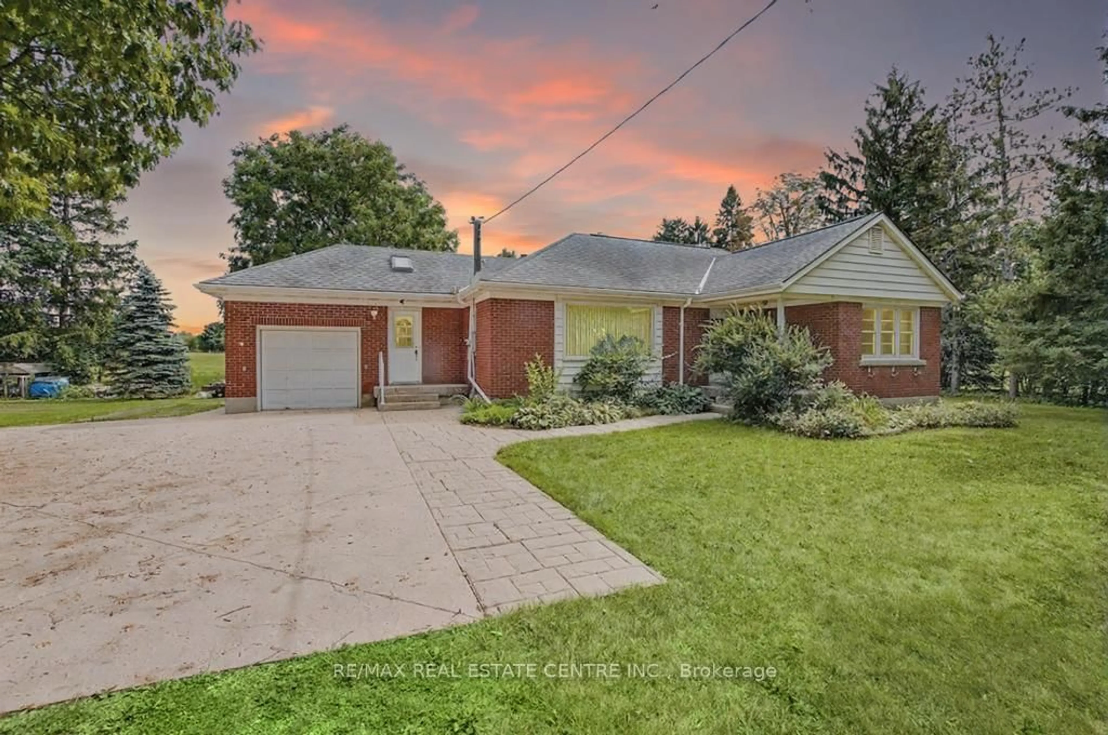 Home with brick exterior material, street for 8007 7 Highway, Guelph/Eramosa Ontario N1H 6H8