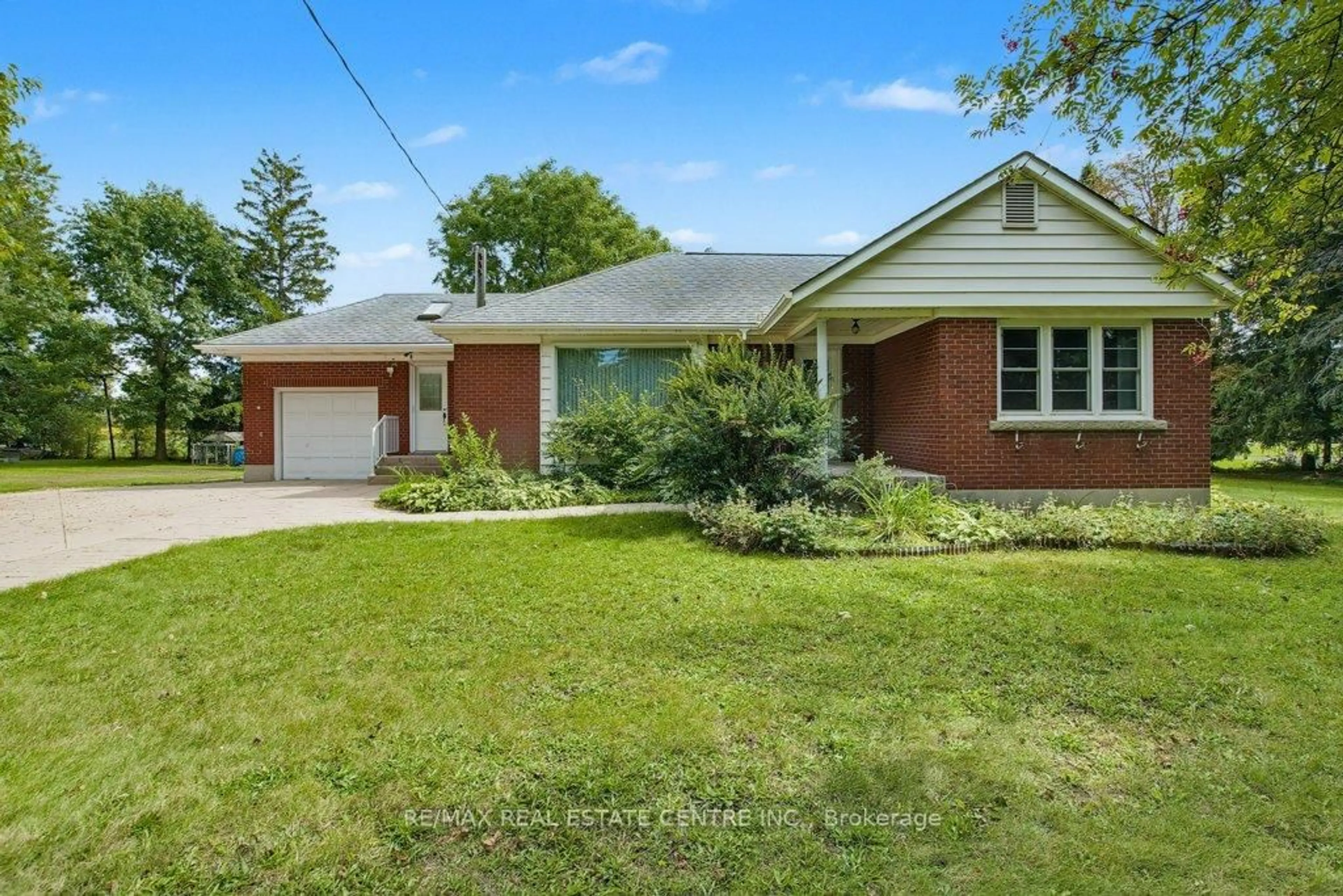 Home with brick exterior material, street for 8007 7 Highway, Guelph/Eramosa Ontario N1H 6H8