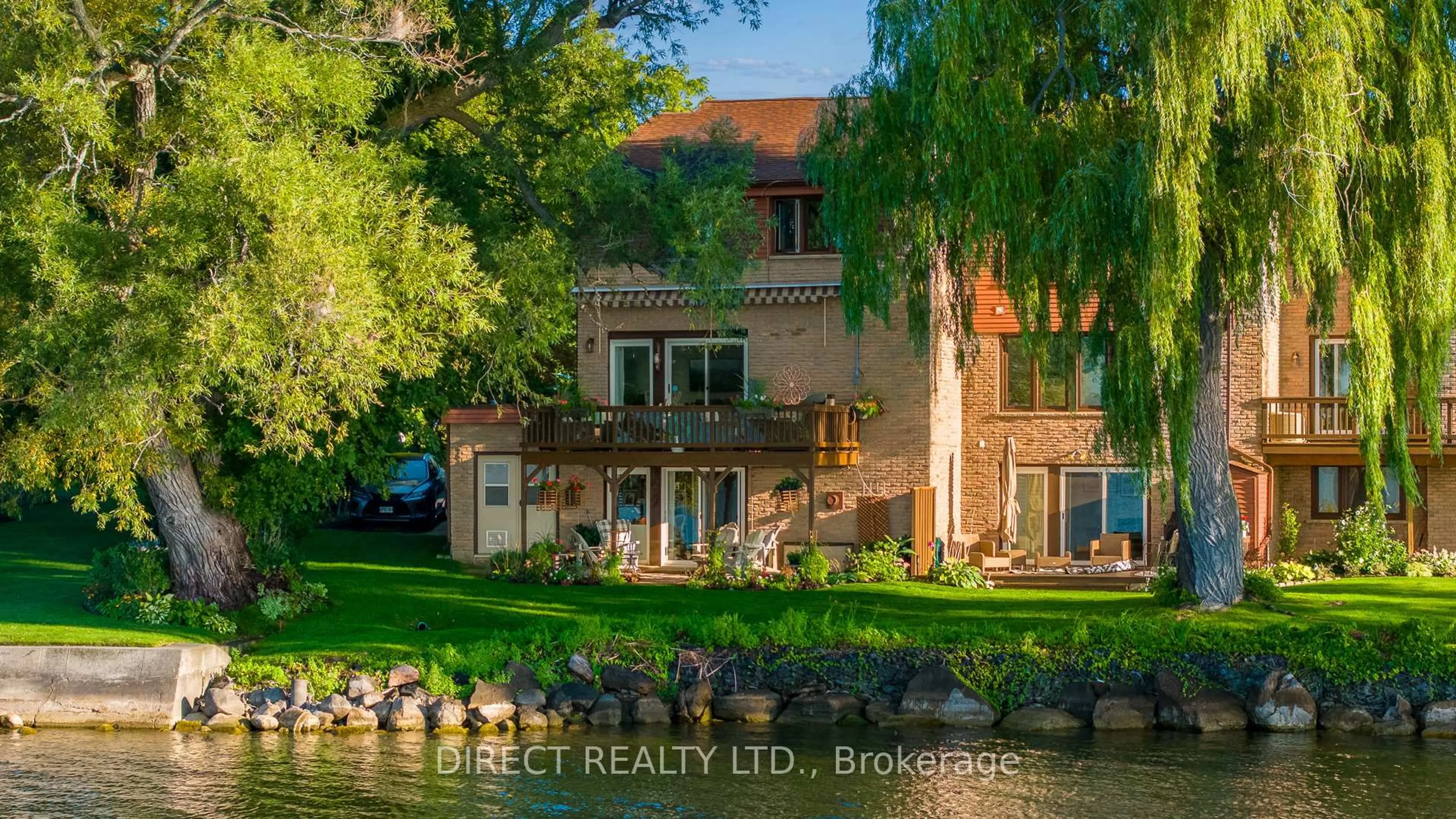 A pic from outside/outdoor area/front of a property/back of a property/a pic from drone, water/lake/river/ocean view for 1798 Old Hwy 2 Highway #15, Quinte West Ontario K8N 4Z2