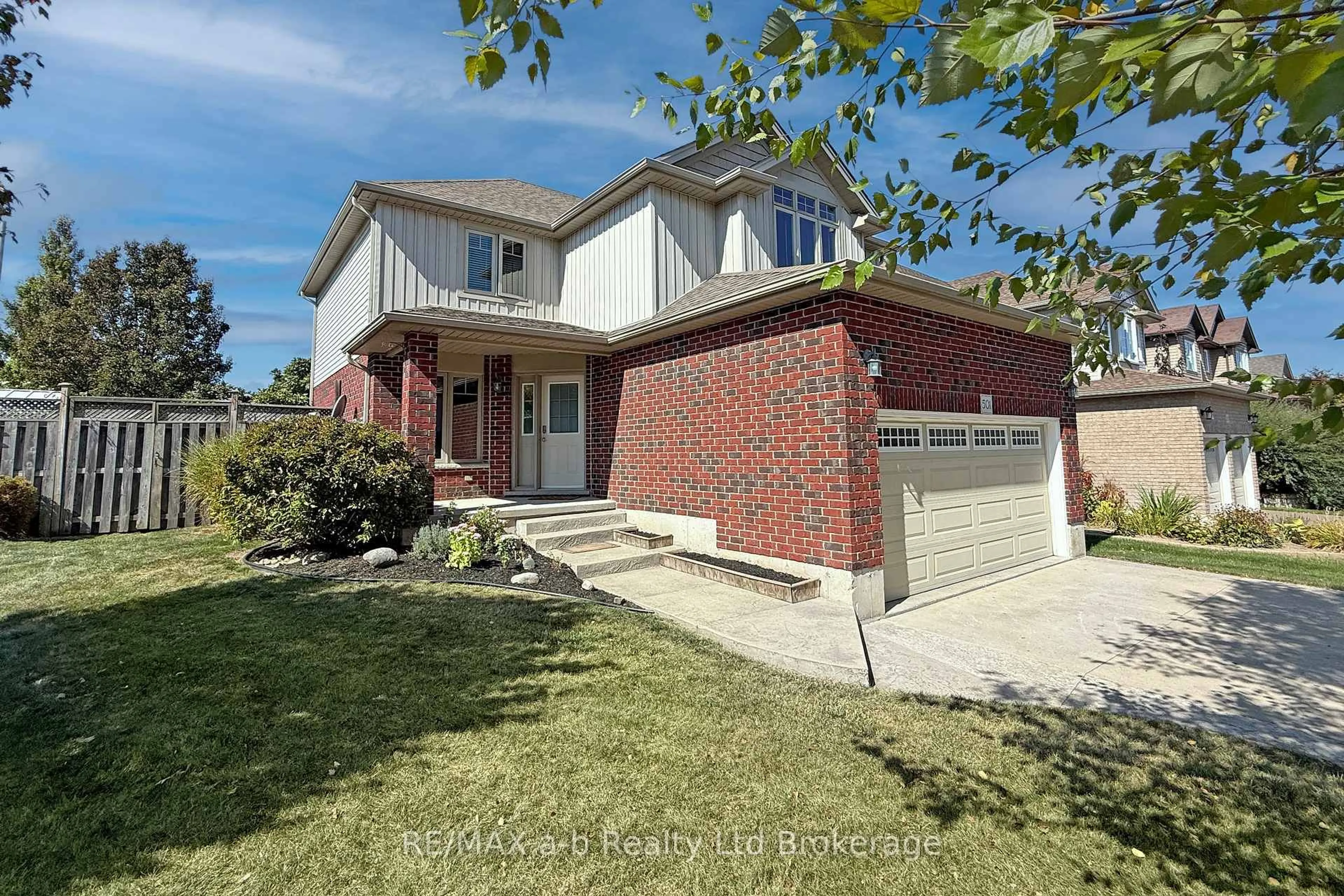 Home with brick exterior material, street for 501 Tatham Blvd, Woodstock Ontario N4T 0A7