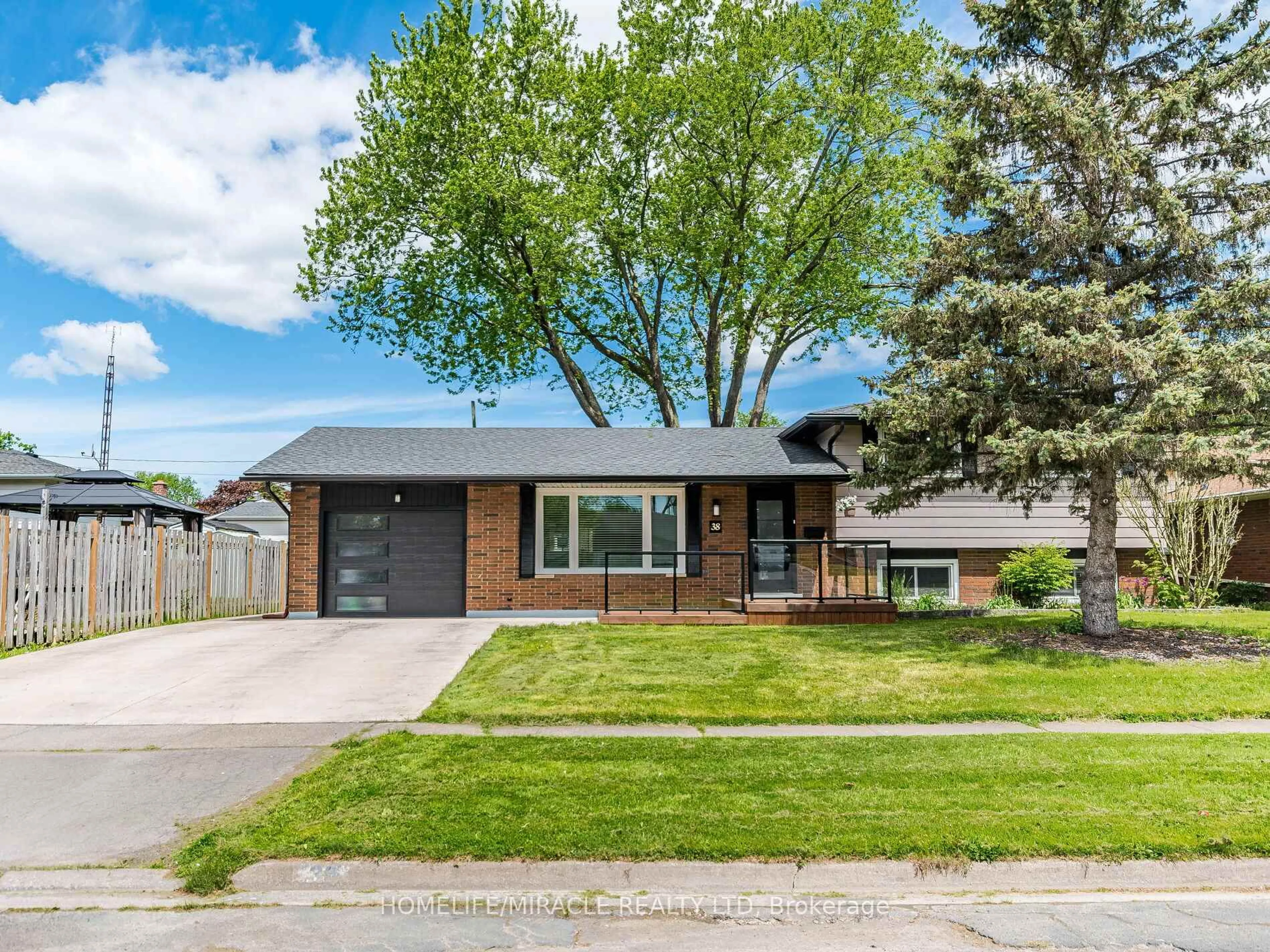 Home with brick exterior material, street for 38 Martha Crt, Welland Ontario L3C 4N2