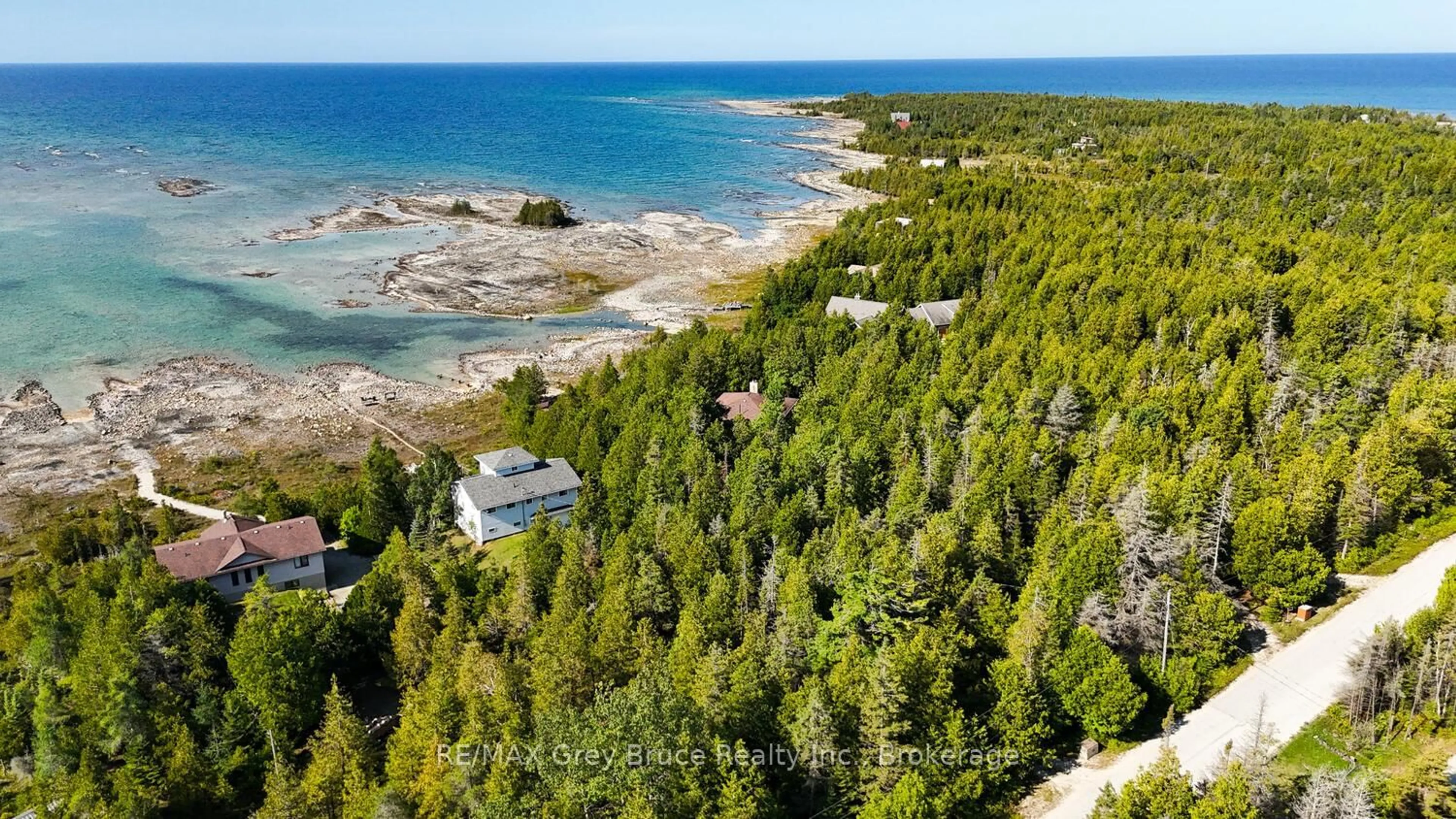 A pic from outside/outdoor area/front of a property/back of a property/a pic from drone, water/lake/river/ocean view for 952 Dorcas Bay Rd, Northern Bruce Peninsula Ontario N0H 2R0