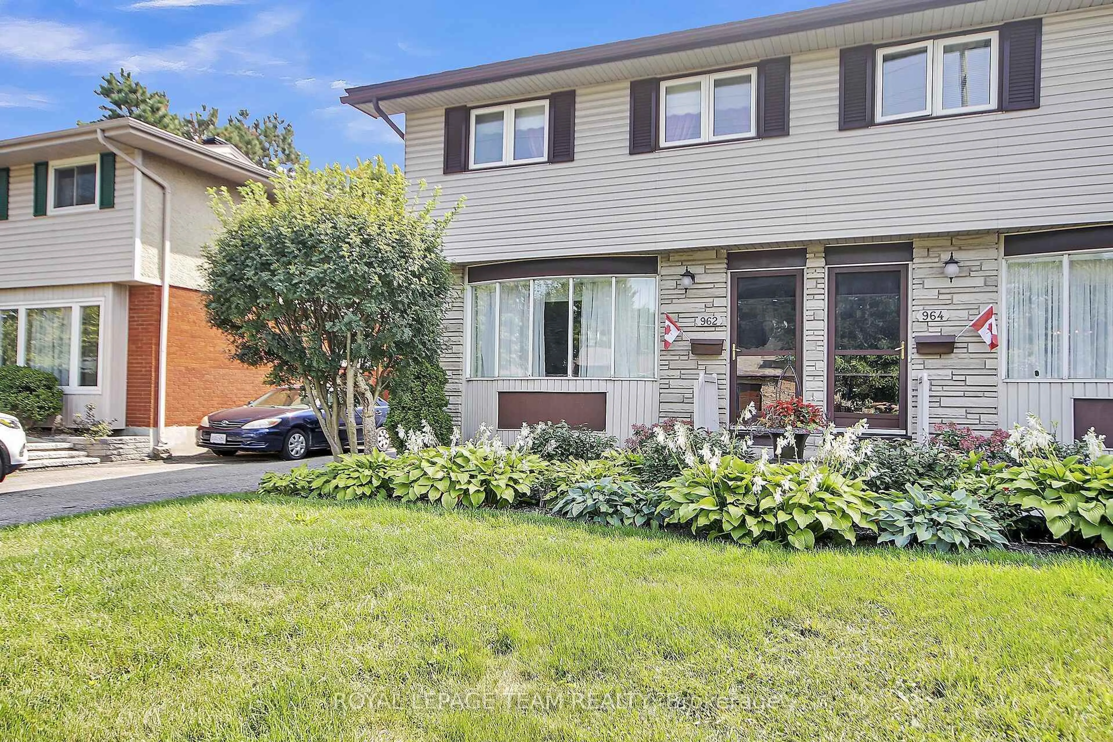 Home with brick exterior material, street for 962 Dynes Rd, Ottawa Ontario K2C 0G8