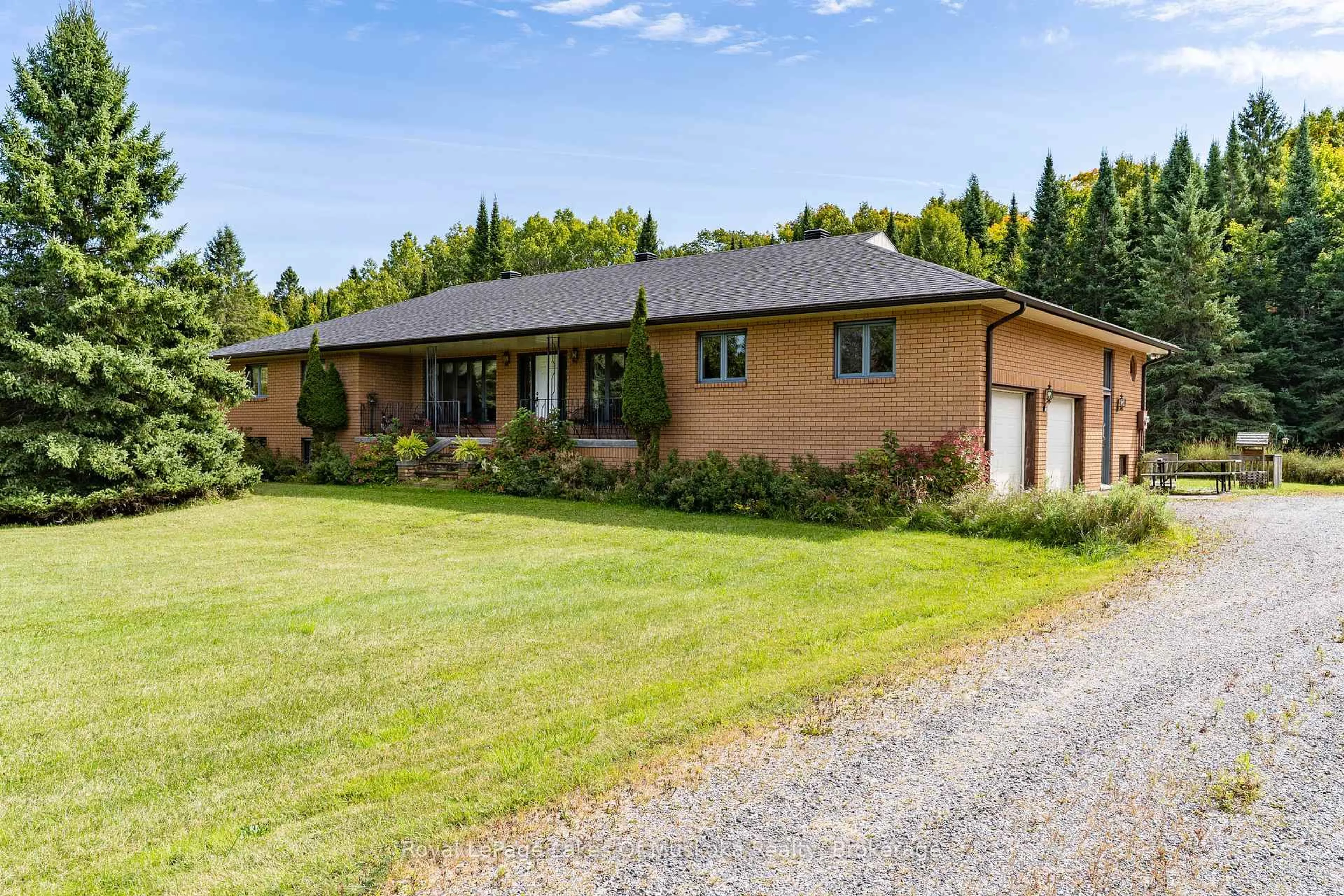 A pic from outside/outdoor area/front of a property/back of a property/a pic from drone, street for 1419 Beatrice Townline Rd, Muskoka Lakes Ontario P1L 1X4