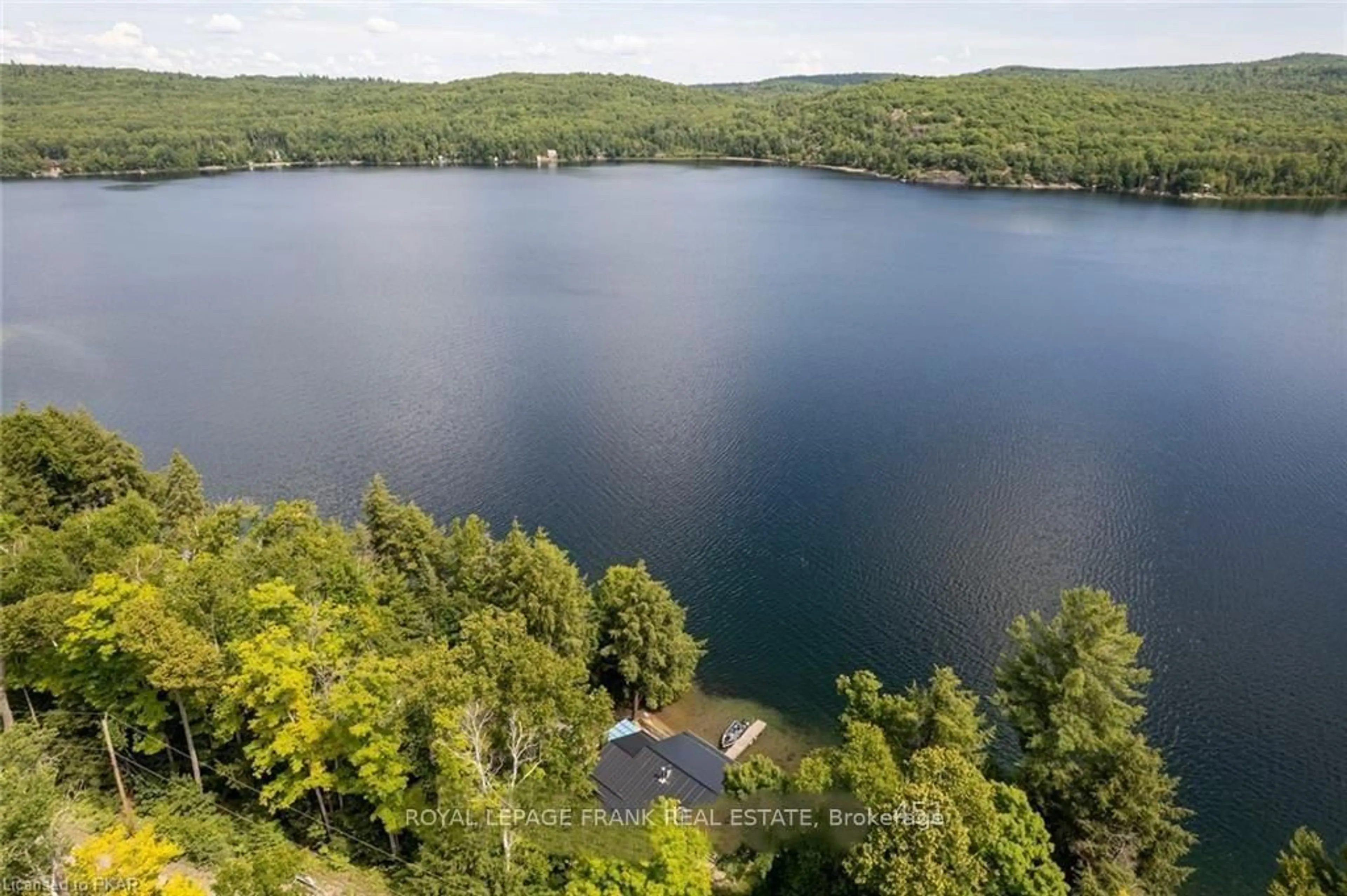 A pic from outside/outdoor area/front of a property/back of a property/a pic from drone, water/lake/river/ocean view for 1758 Papineau Lake Rd, Maple Leaf Ontario K0L 2R0