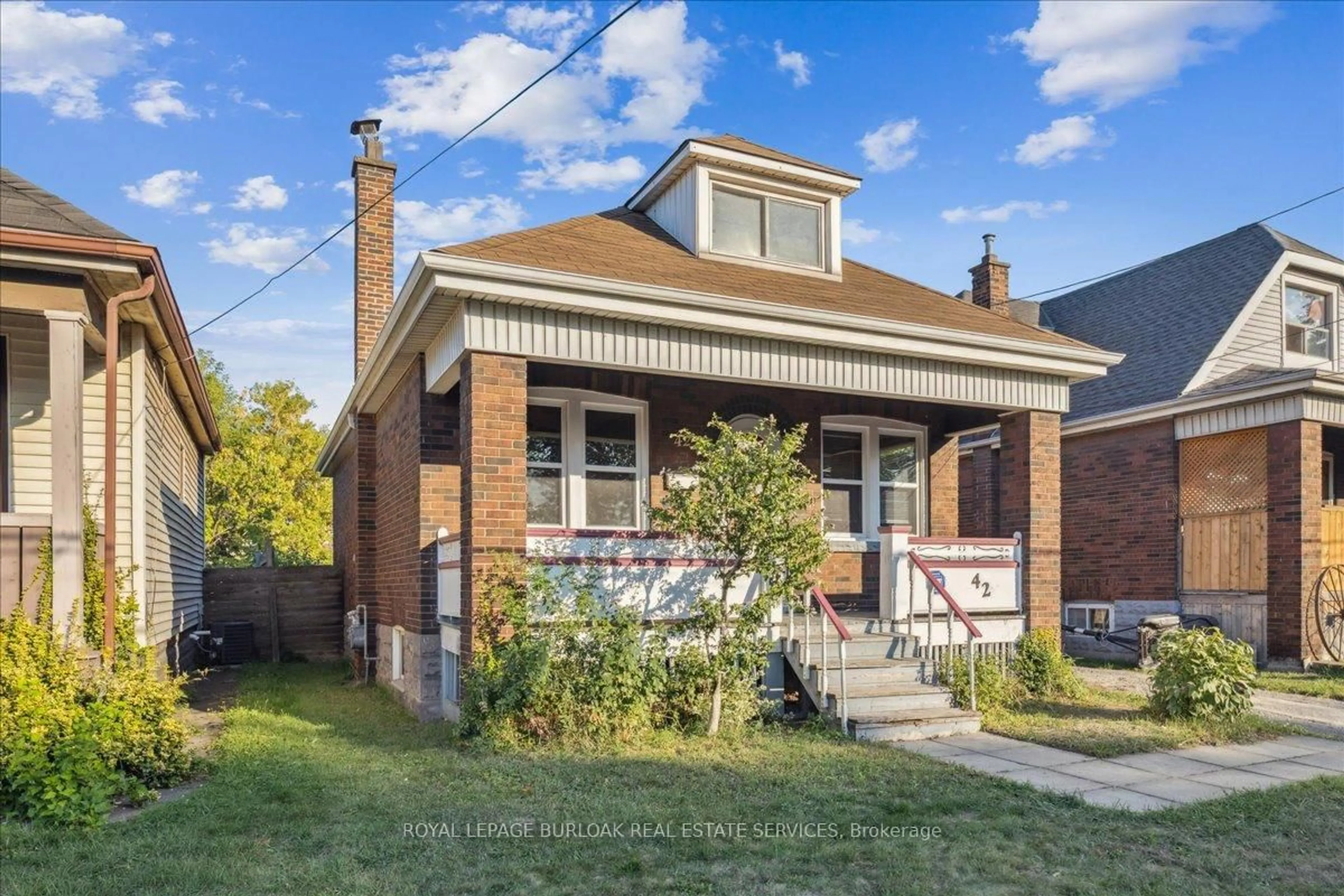 Home with brick exterior material, street for 42 Martimas Ave, Hamilton Ontario L8H 3N2