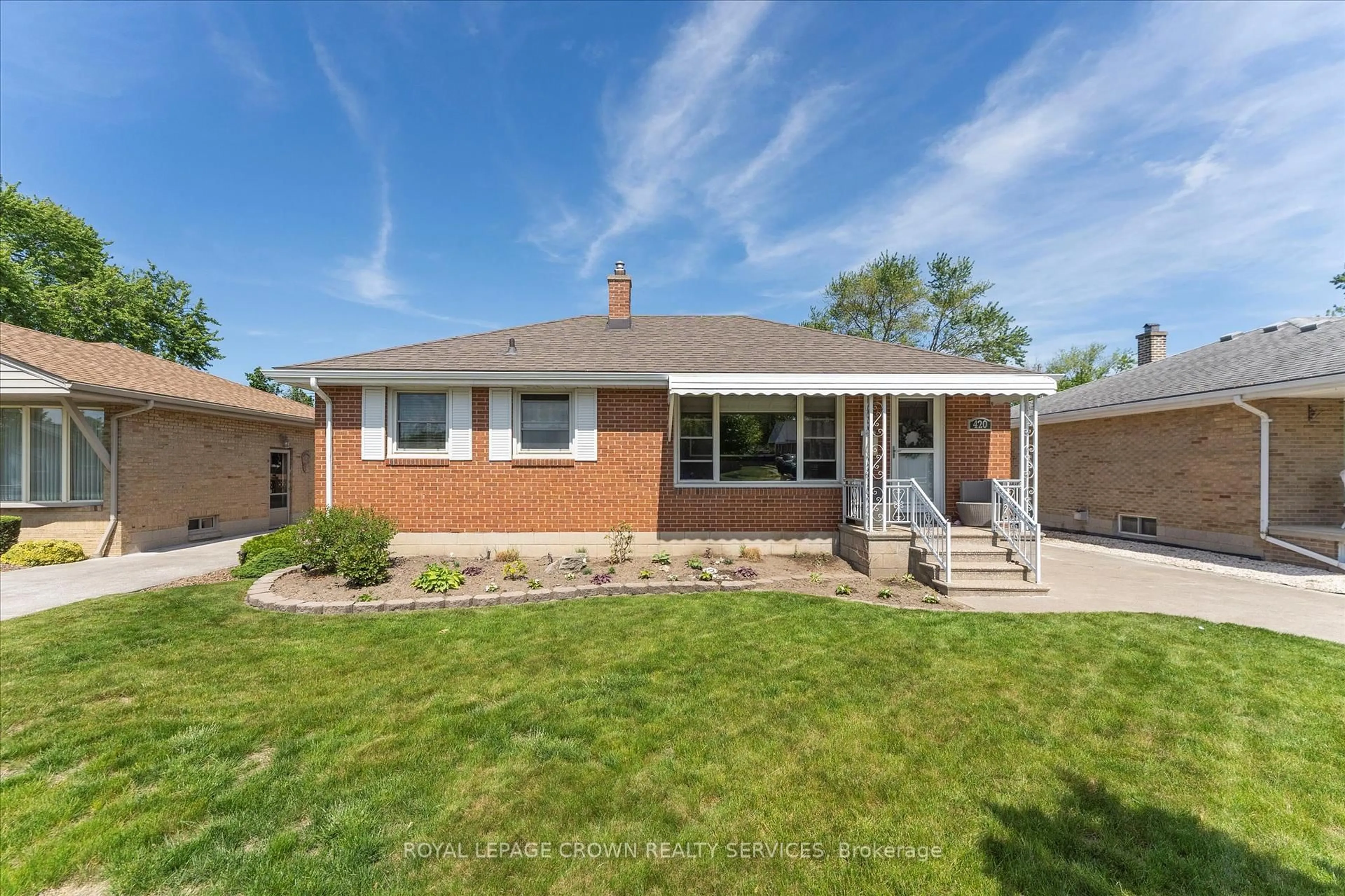Home with brick exterior material, street for 420 Watson Ave, Windsor Ontario N8S 3S6