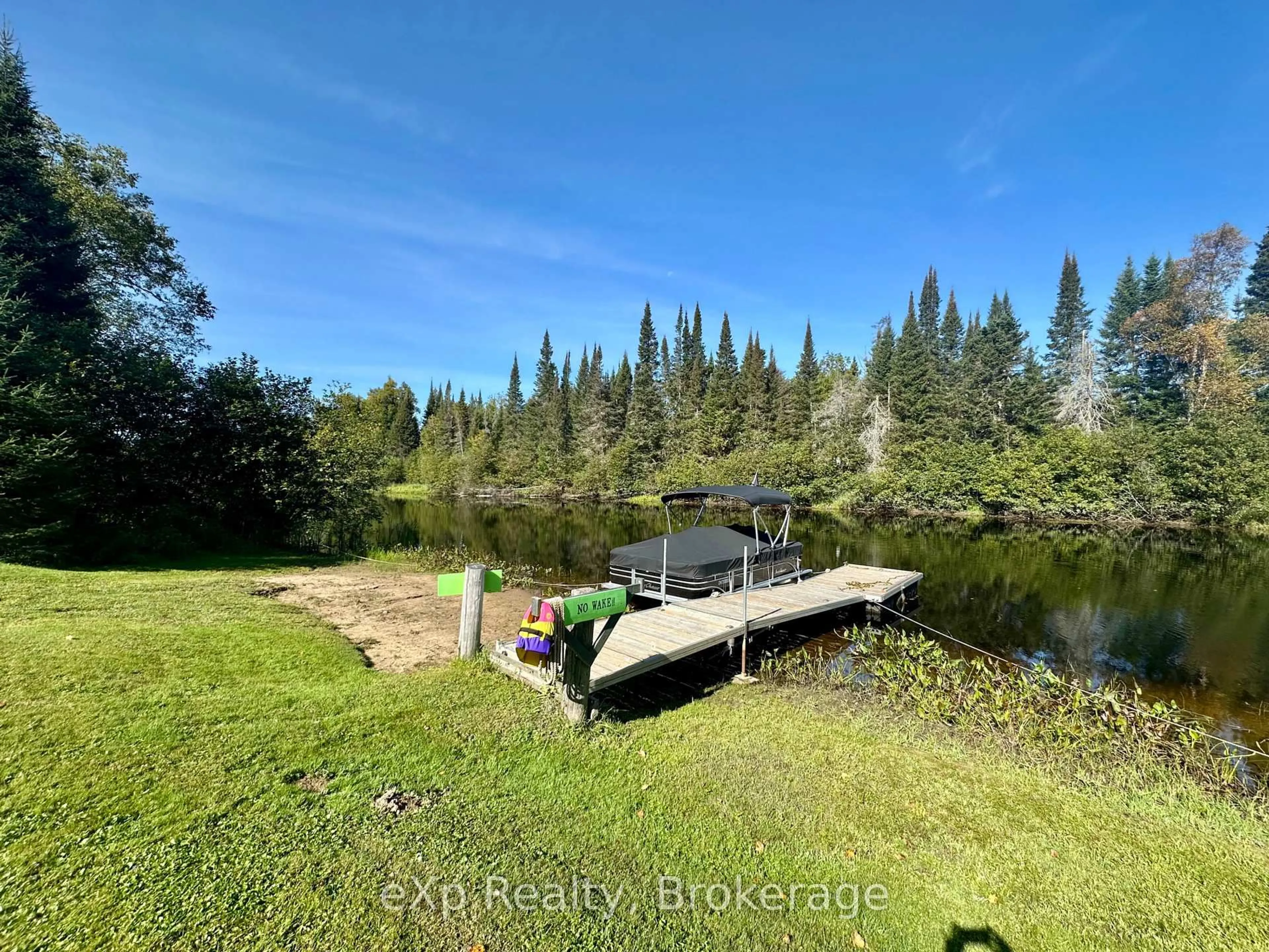 A pic from outside/outdoor area/front of a property/back of a property/a pic from drone, water/lake/river/ocean view for 249 River Dr, Burk's Falls Ontario P0A 1C0