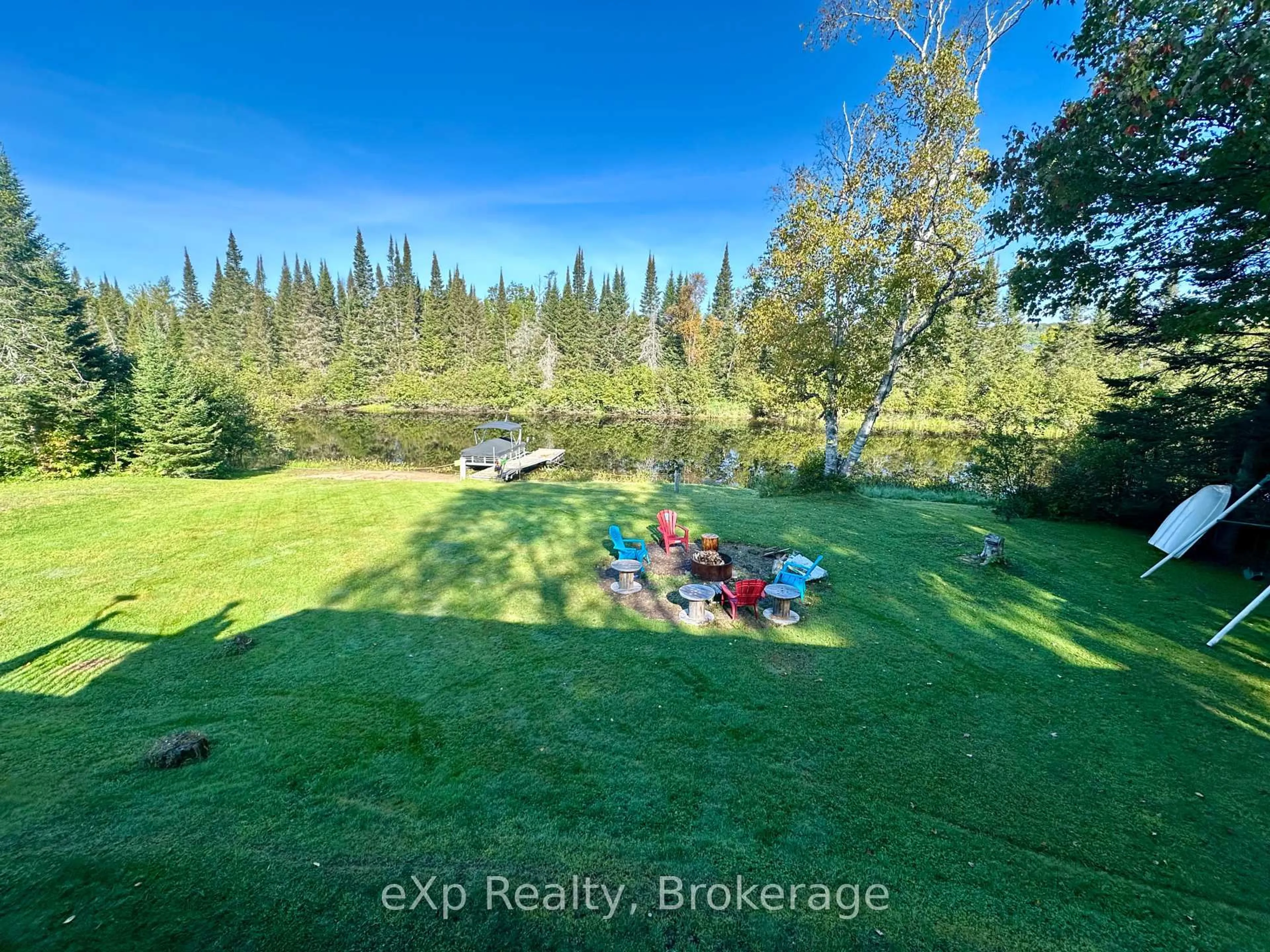 A pic from outside/outdoor area/front of a property/back of a property/a pic from drone, water/lake/river/ocean view for 249 River Dr, Burk's Falls Ontario P0A 1C0