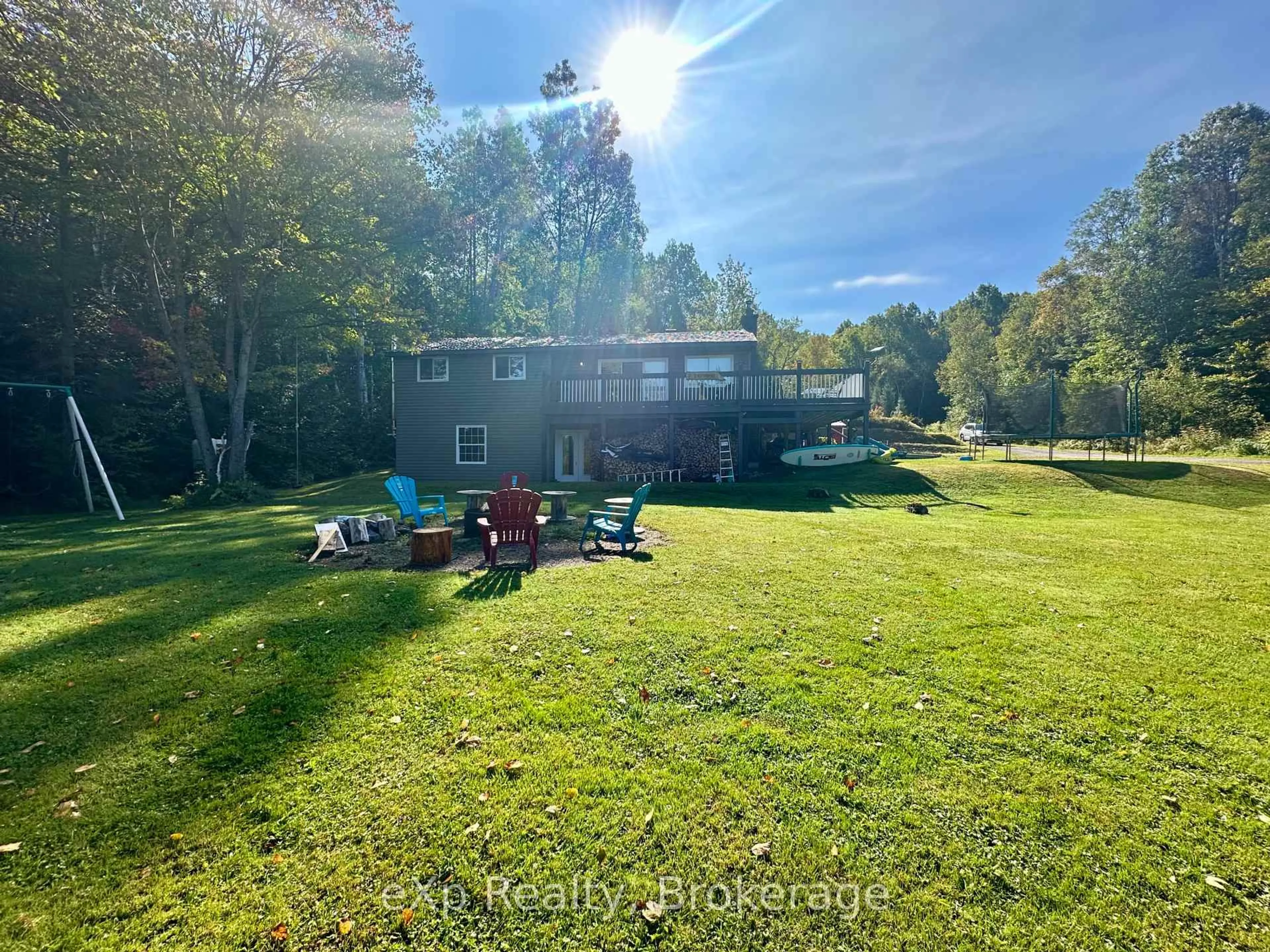 A pic from outside/outdoor area/front of a property/back of a property/a pic from drone, water/lake/river/ocean view for 249 River Dr, Burk's Falls Ontario P0A 1C0