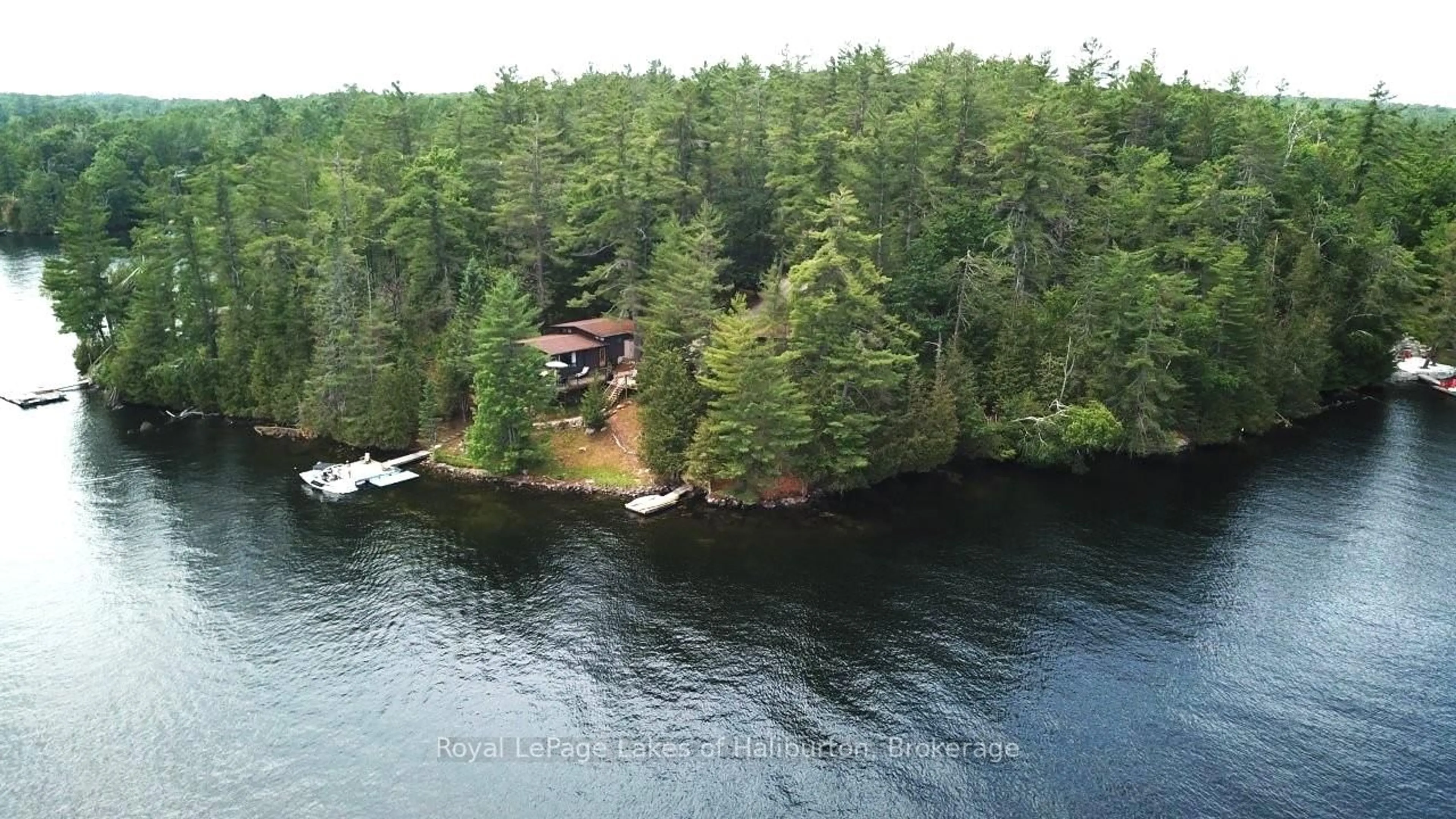 A pic from outside/outdoor area/front of a property/back of a property/a pic from drone, water/lake/river/ocean view for 102 Fire Route 364A Rte, Trent Lakes Ontario K0M 2A0