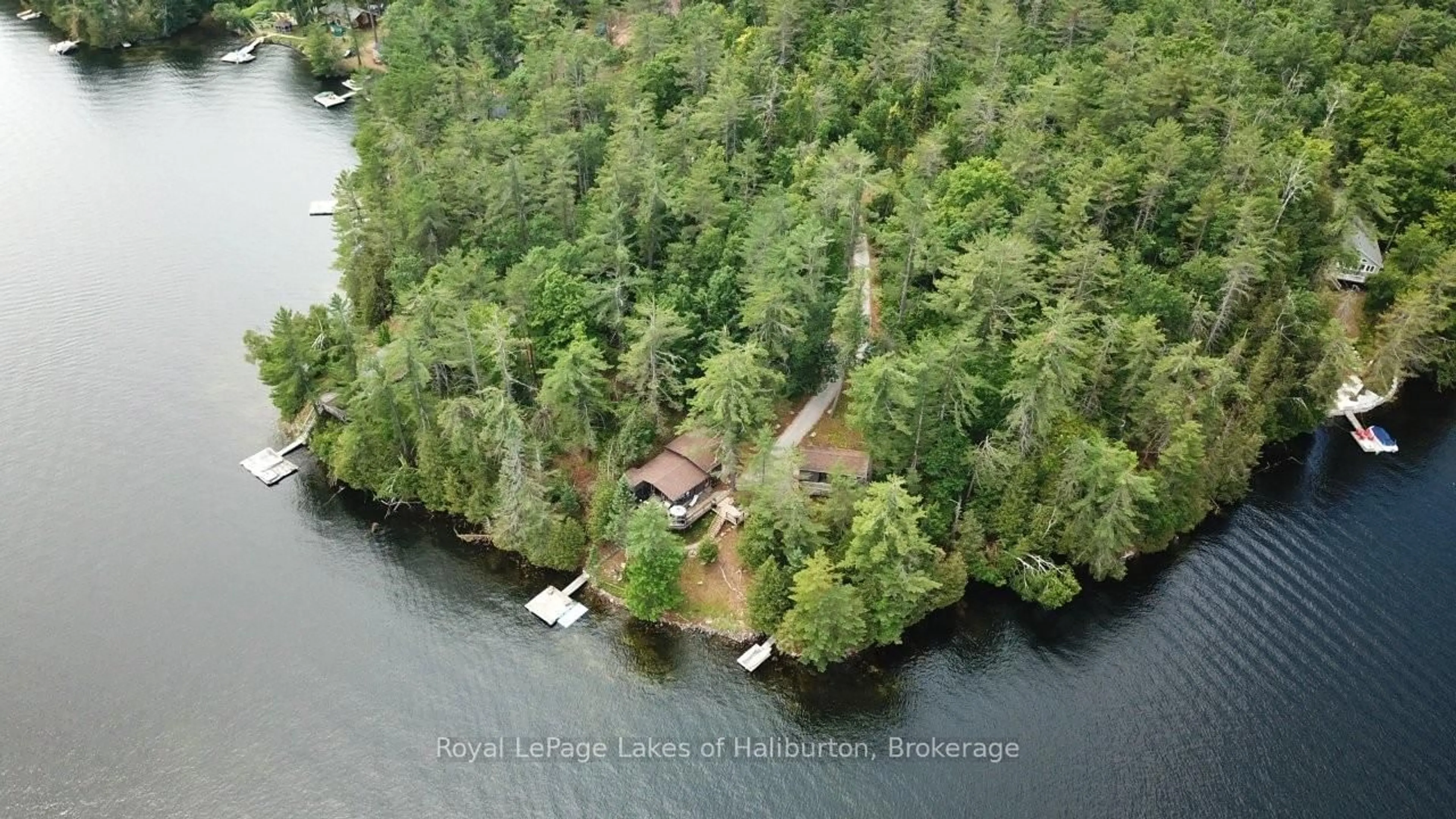 A pic from outside/outdoor area/front of a property/back of a property/a pic from drone, water/lake/river/ocean view for 102 Fire Route 364A Rte, Trent Lakes Ontario K0M 2A0