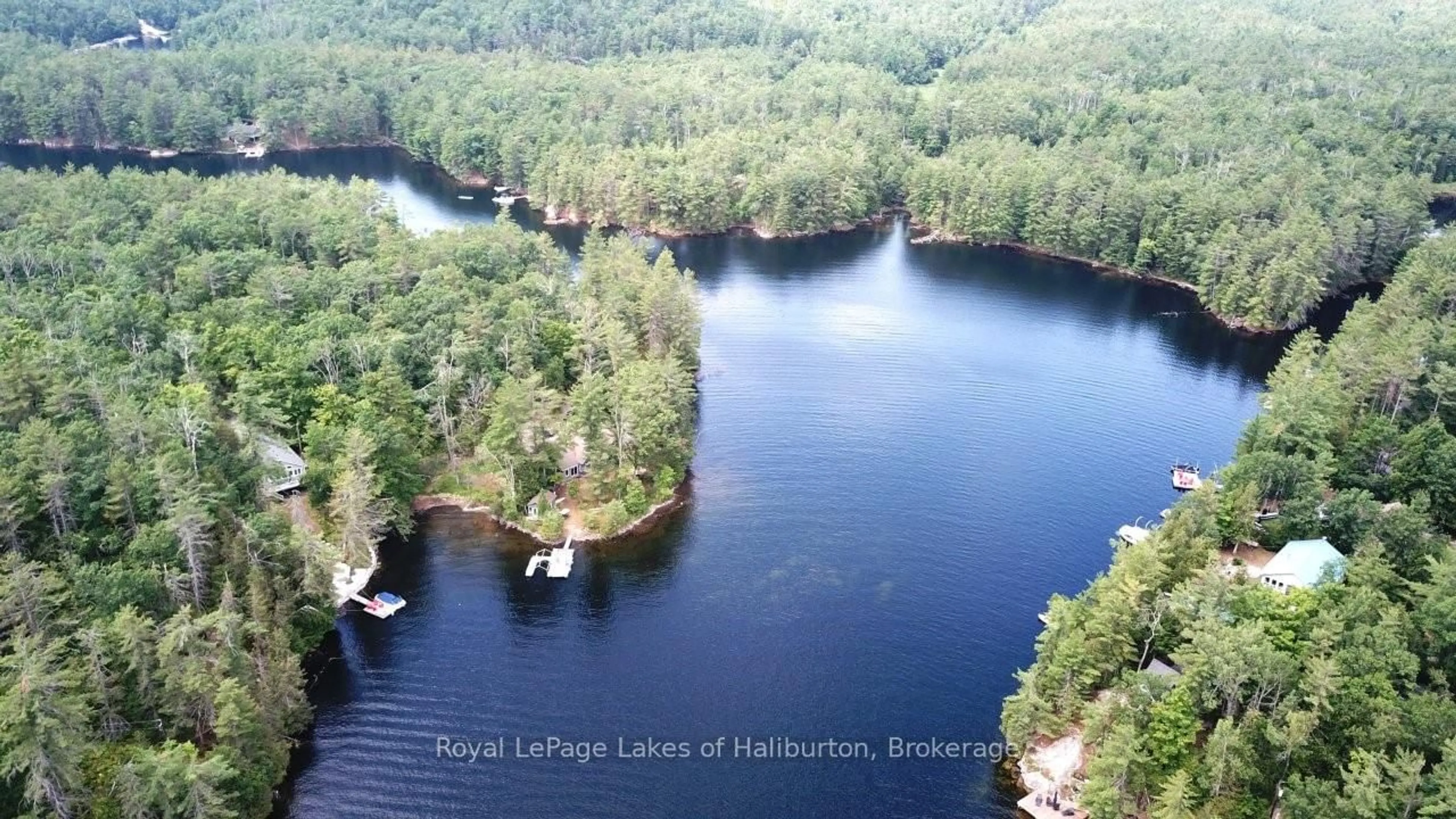 A pic from outside/outdoor area/front of a property/back of a property/a pic from drone, water/lake/river/ocean view for 102 Fire Route 364A Rte, Trent Lakes Ontario K0M 2A0