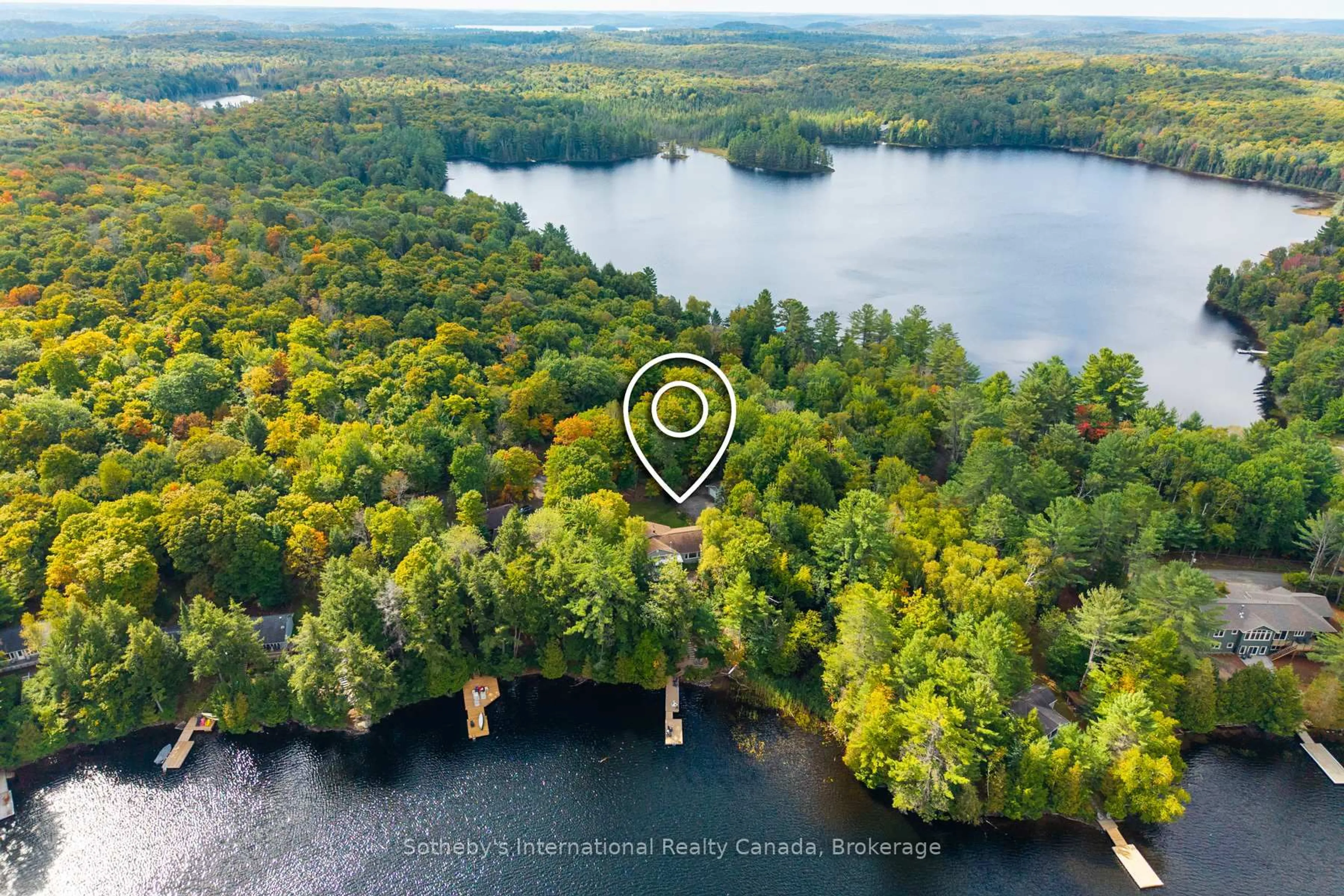 A pic from outside/outdoor area/front of a property/back of a property/a pic from drone, water/lake/river/ocean view for 20 Fish Rock Rd, Huntsville Ontario P1H 2N5