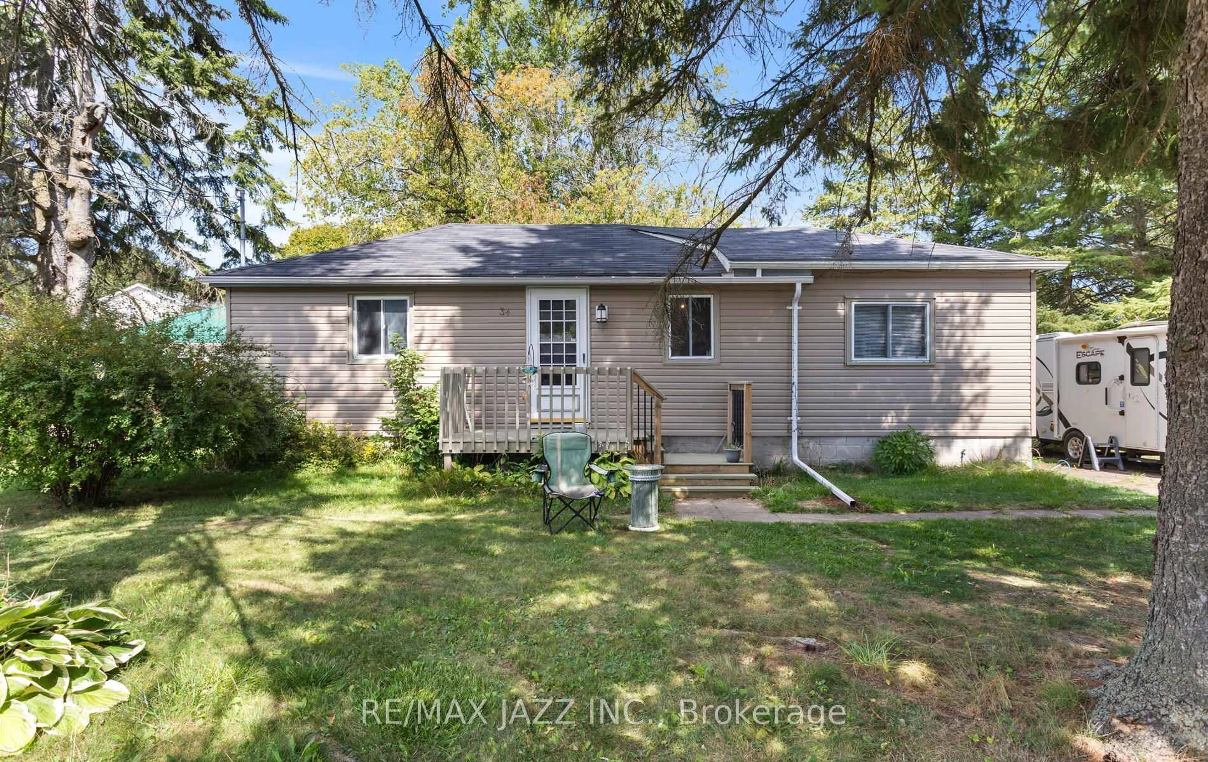 Home with vinyl exterior material, street for 34 Fawcette Ave, Prince Edward County Ontario K0K 2T0