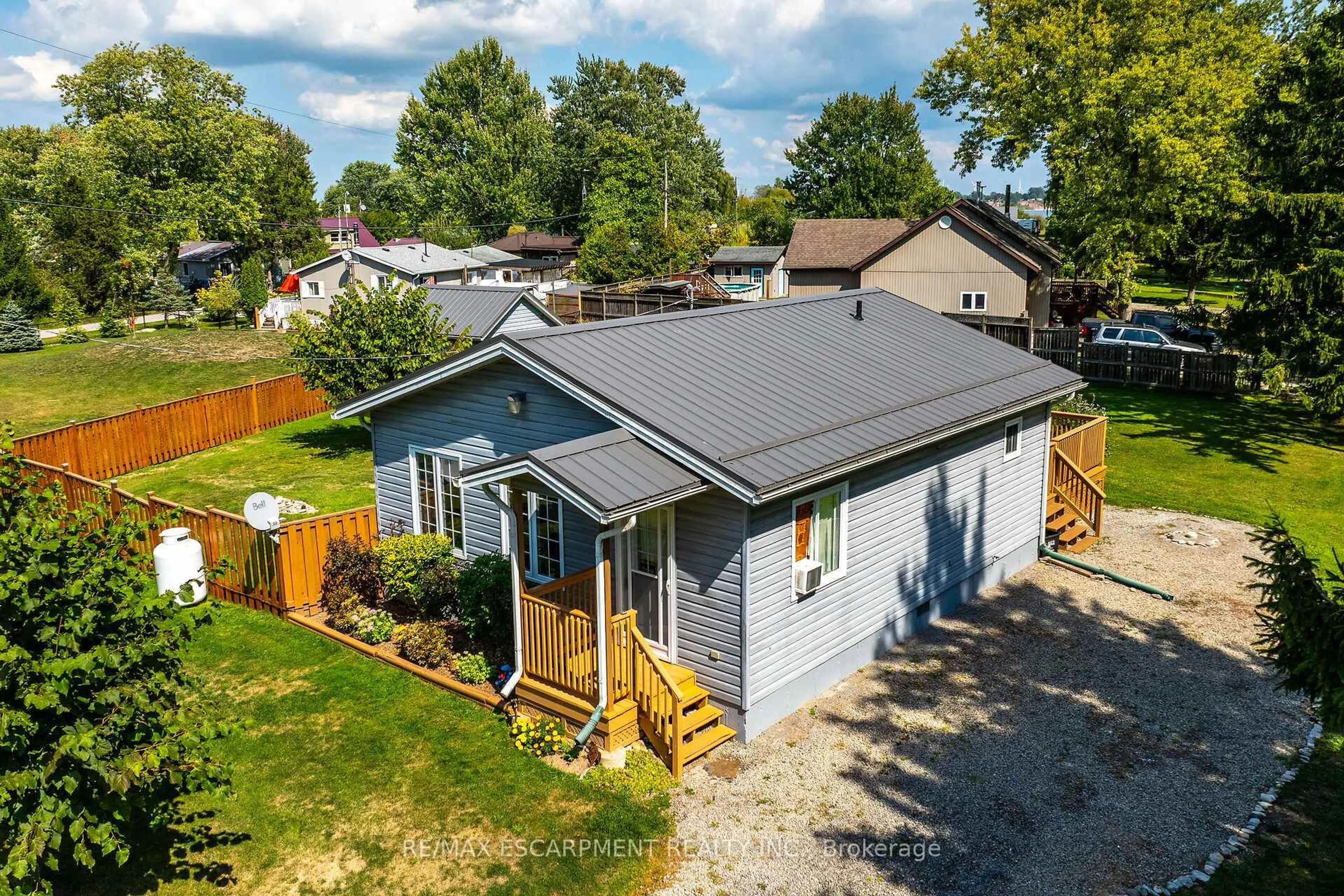 A pic from outside/outdoor area/front of a property/back of a property/a pic from drone, street for 8 Downey Rd, Haldimand Ontario N0A 1K0