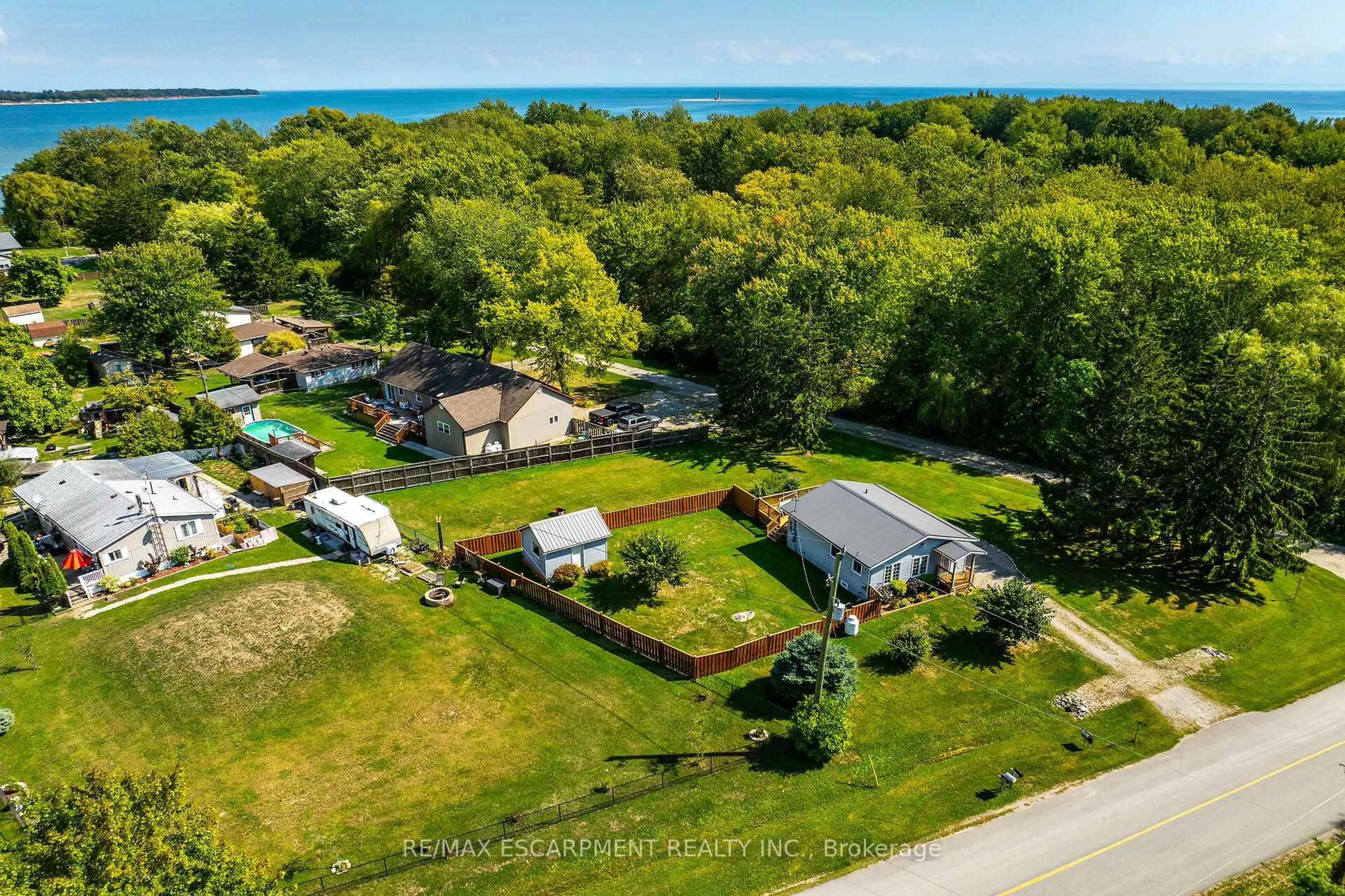 A pic from outside/outdoor area/front of a property/back of a property/a pic from drone, water/lake/river/ocean view for 8 Downey Rd, Haldimand Ontario N0A 1K0