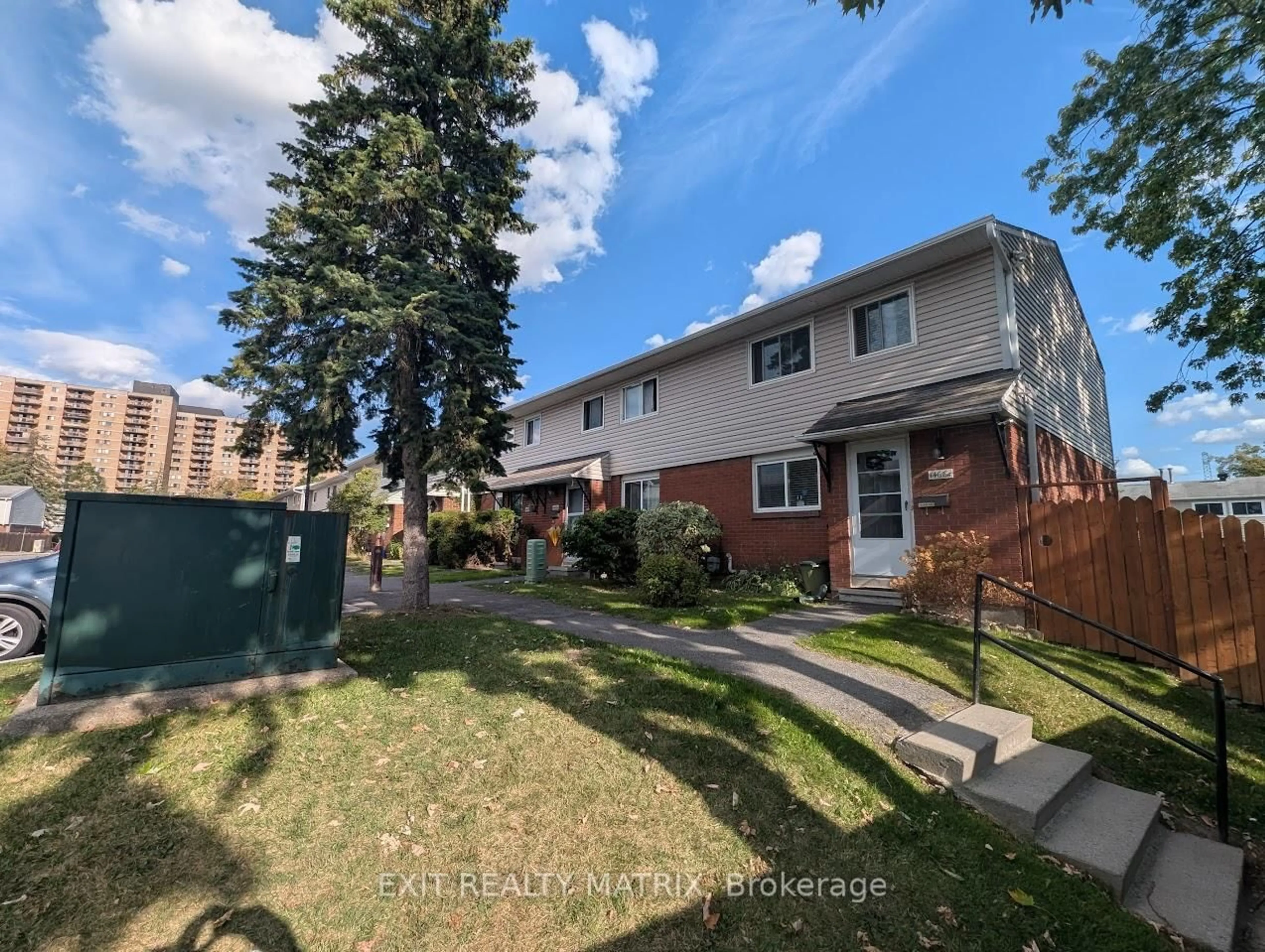A pic from outside/outdoor area/front of a property/back of a property/a pic from drone, street for 1468 Heatherington Rd #B, Ottawa Ontario K1V 6S1
