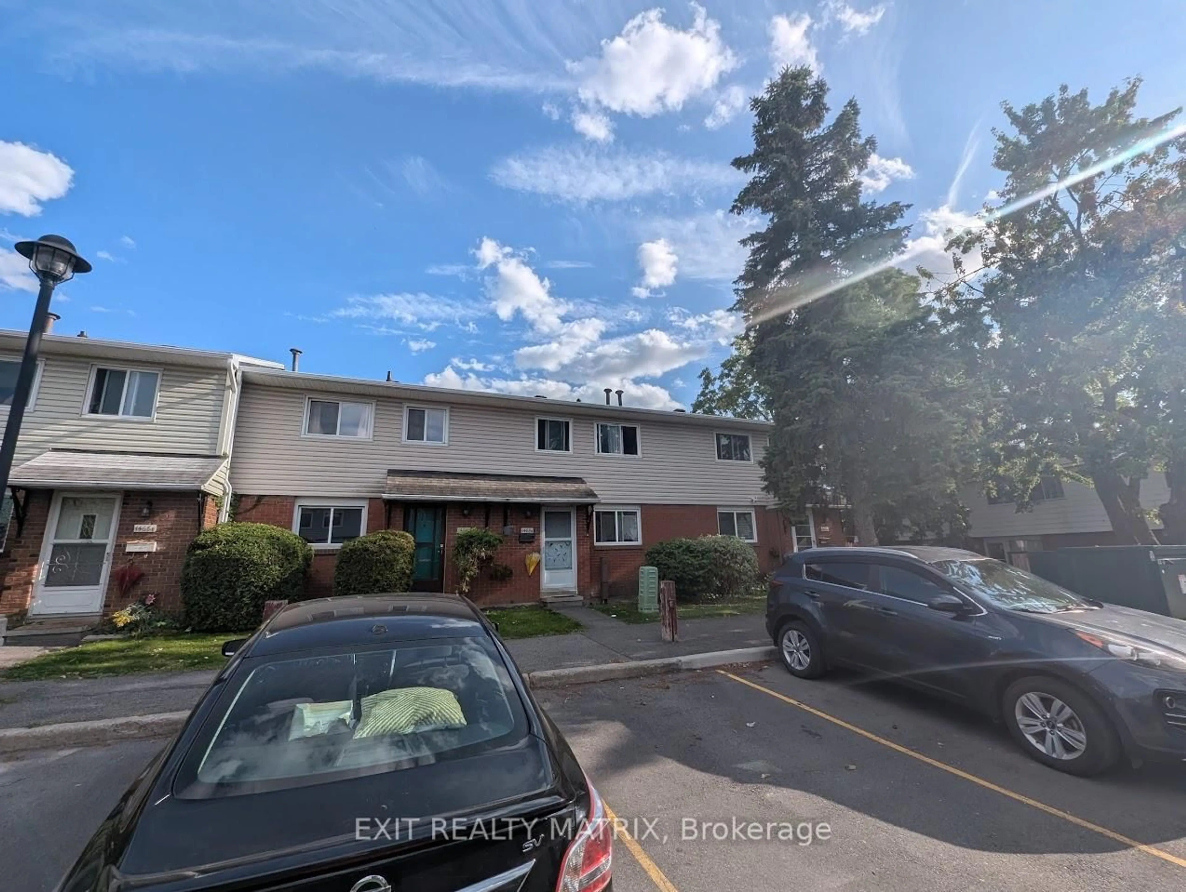A pic from outside/outdoor area/front of a property/back of a property/a pic from drone, street for 1468 Heatherington Rd #B, Ottawa Ontario K1V 6S1