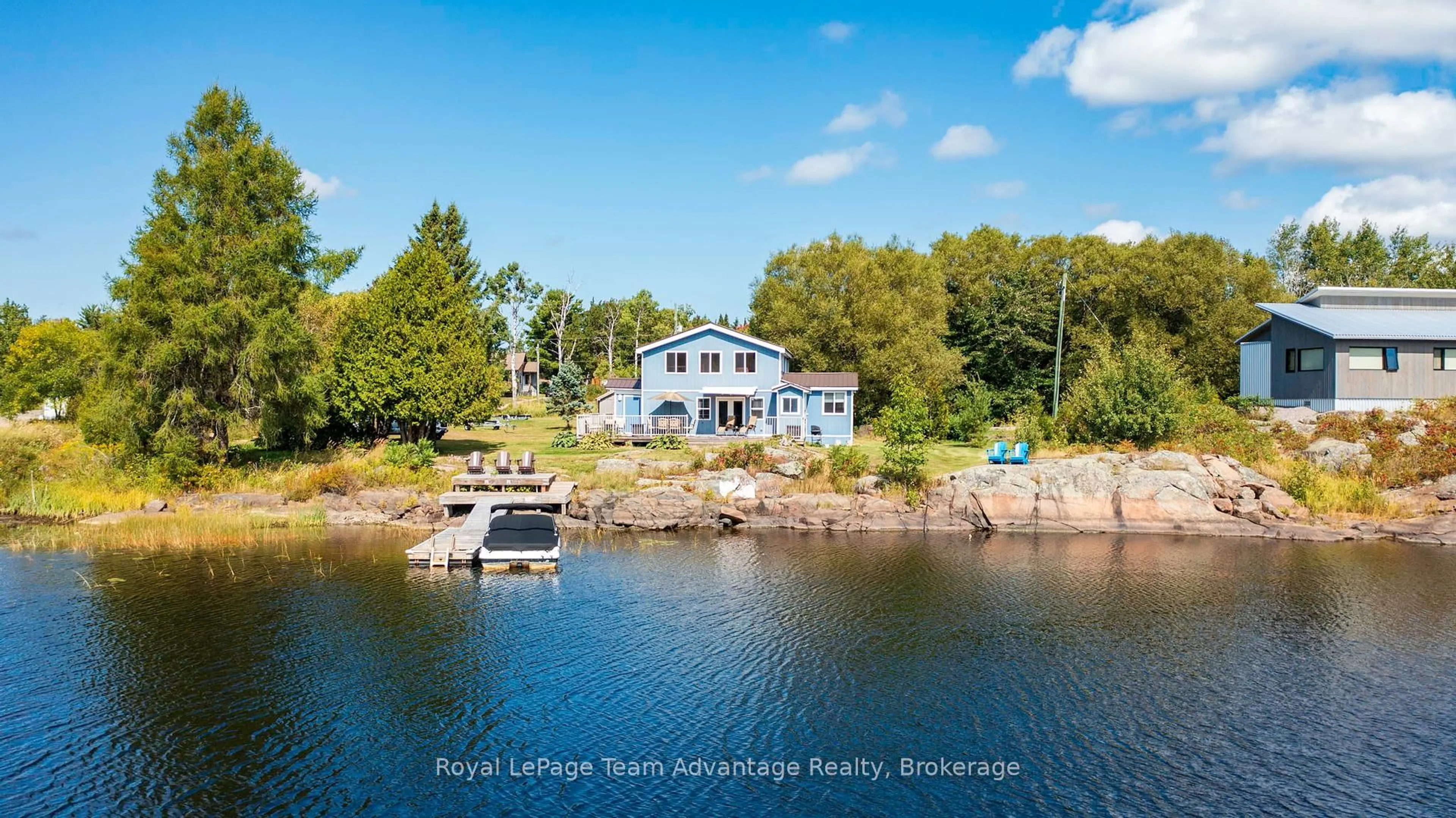 A pic from outside/outdoor area/front of a property/back of a property/a pic from drone, water/lake/river/ocean view for 2046 Riverside Dr, Parry Sound Remote Area Ontario P0G 1A0