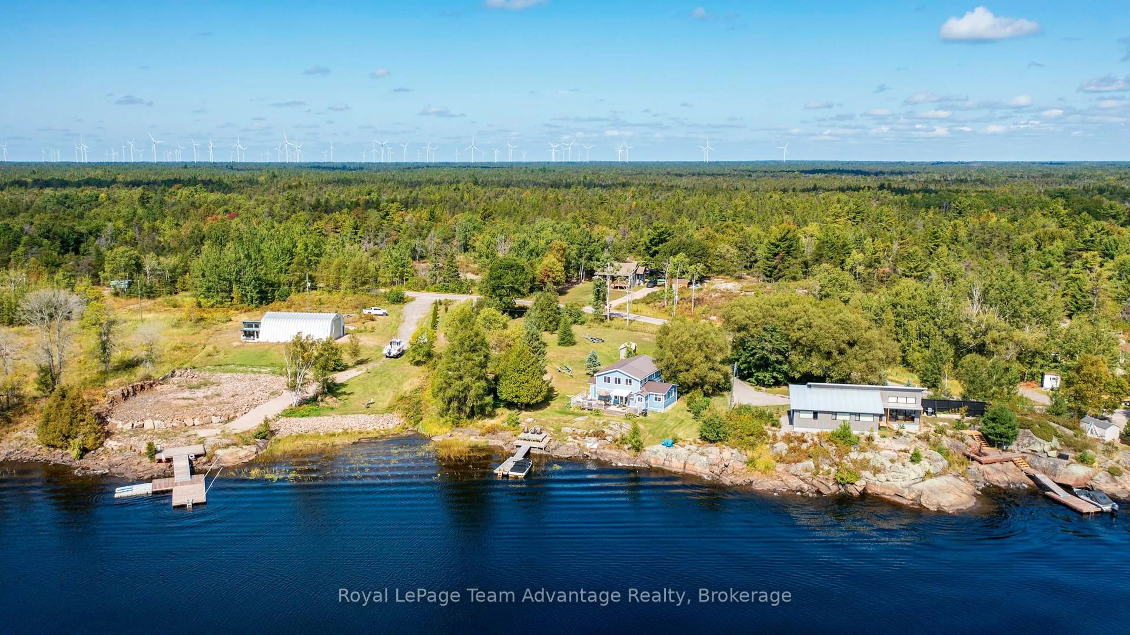 A pic from outside/outdoor area/front of a property/back of a property/a pic from drone, water/lake/river/ocean view for 2046 Riverside Dr, Parry Sound Remote Area Ontario P0G 1A0