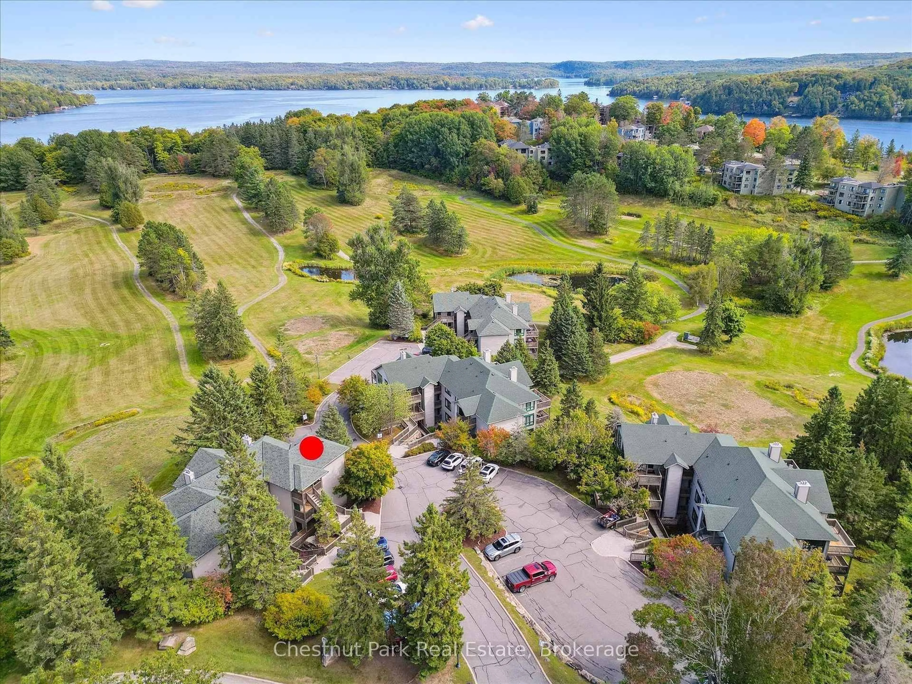 A pic from outside/outdoor area/front of a property/back of a property/a pic from drone, water/lake/river/ocean view for 1235 Deerhurst Dr #31-303, Huntsville Ontario P1H 2E8