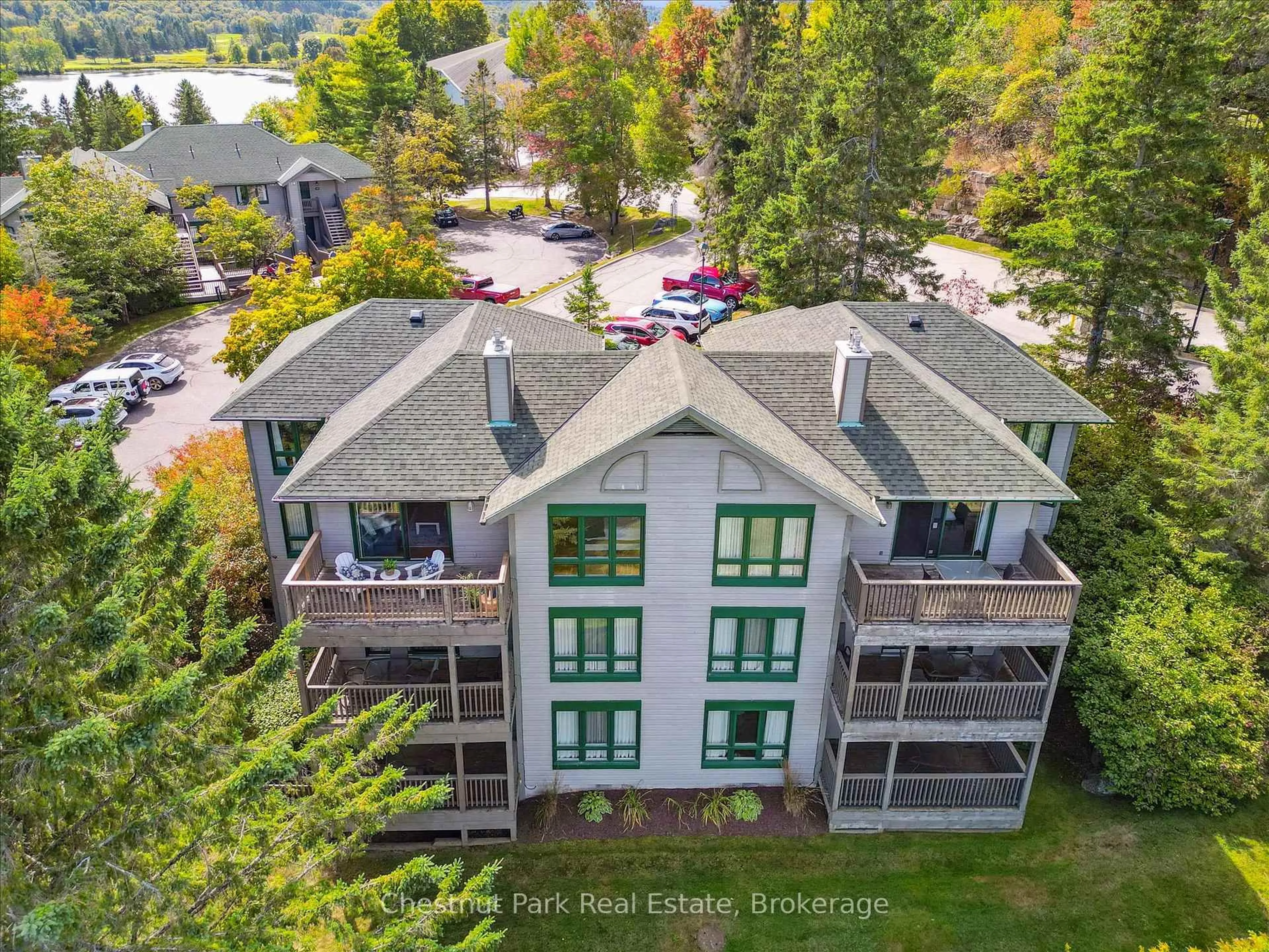A pic from outside/outdoor area/front of a property/back of a property/a pic from drone, water/lake/river/ocean view for 1235 Deerhurst Dr #31-303, Huntsville Ontario P1H 2E8