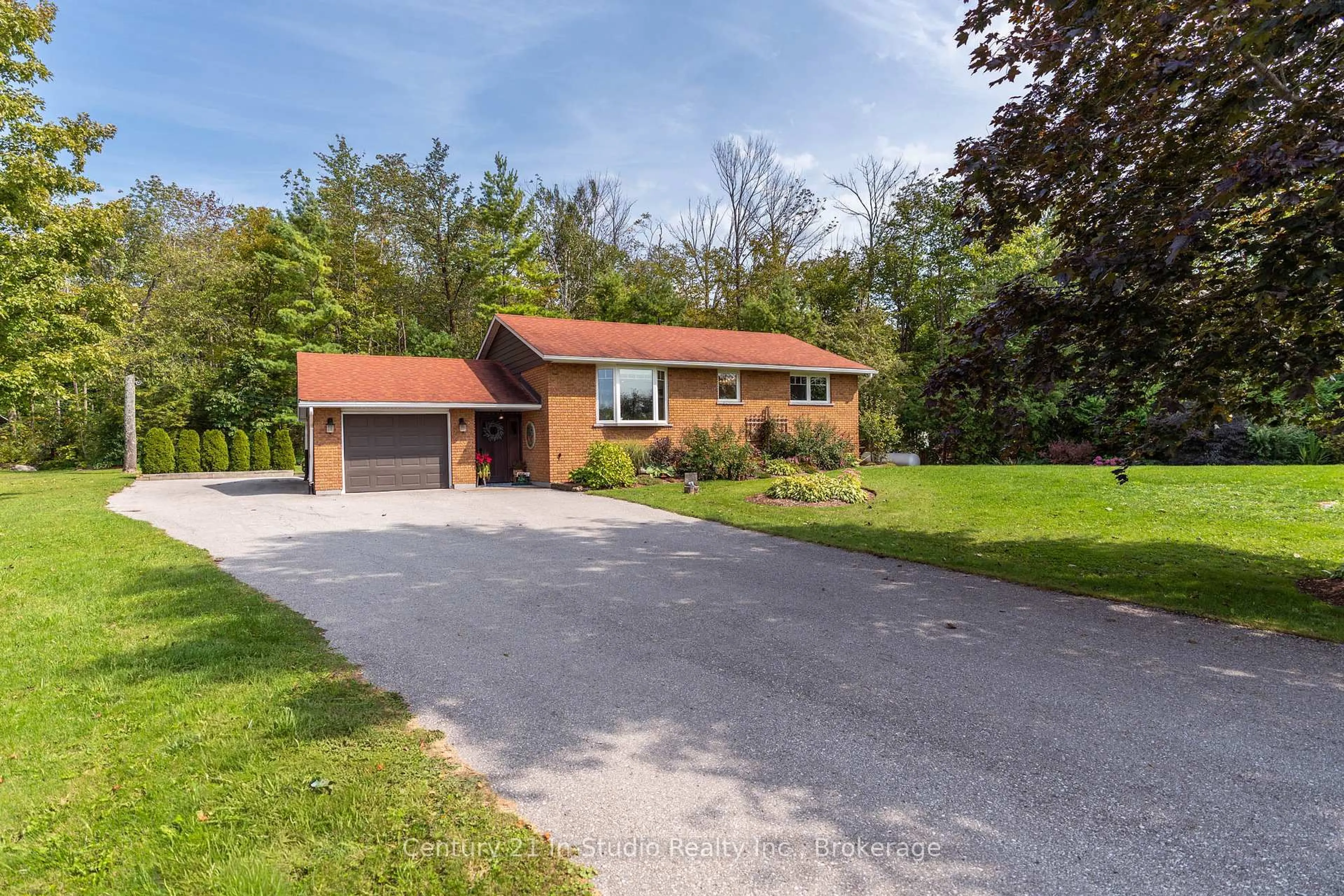 A pic from outside/outdoor area/front of a property/back of a property/a pic from drone, street for 58159 12th Line, Meaford Ontario N4L 1W5
