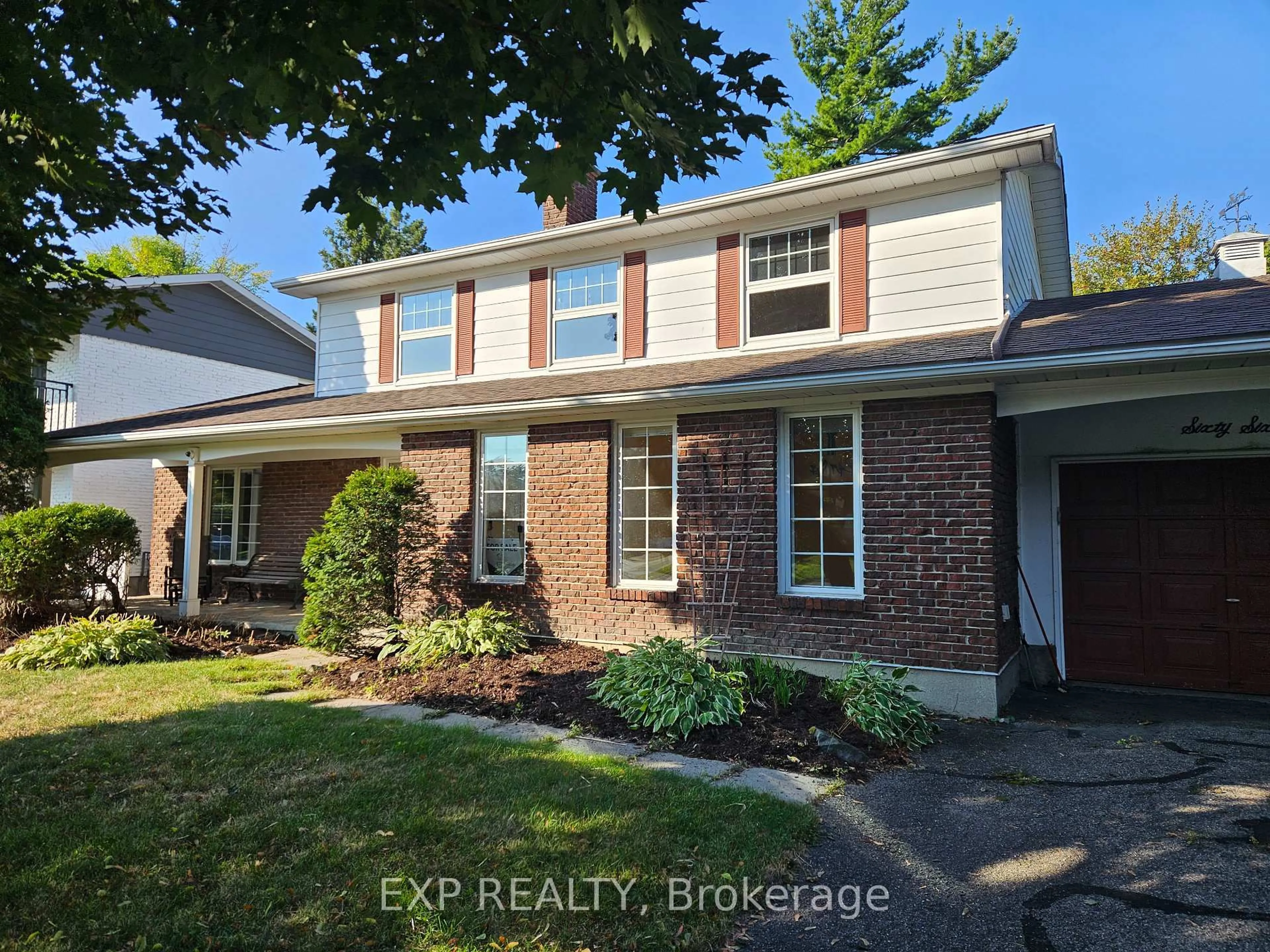 Home with brick exterior material, street for 66 Queensline Dr, Ottawa Ontario K2H 7J5