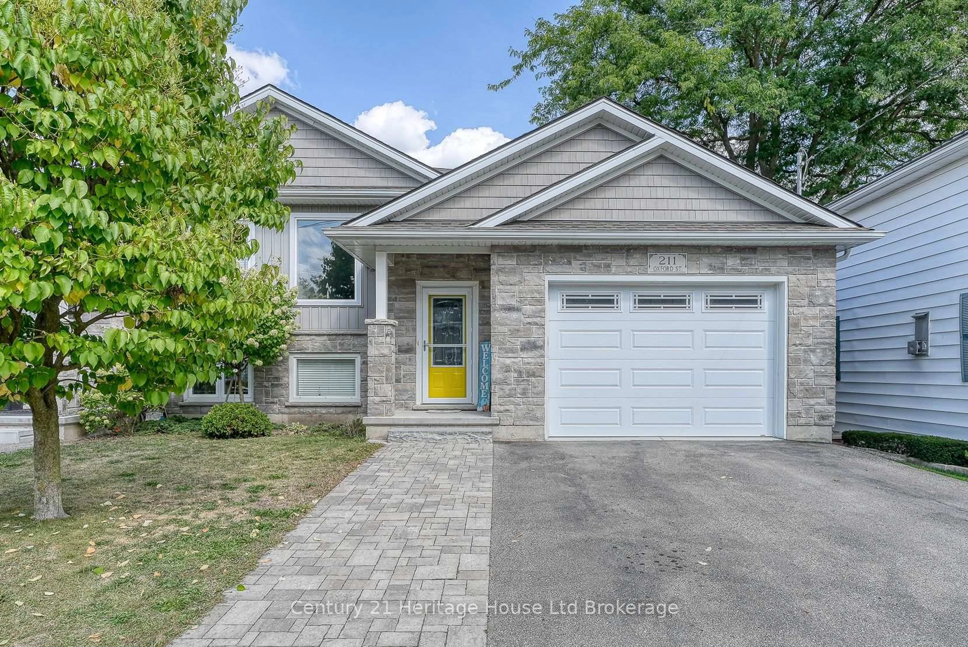 Home with brick exterior material, street for 211 Oxford St, Ingersoll Ontario N5C 2V8