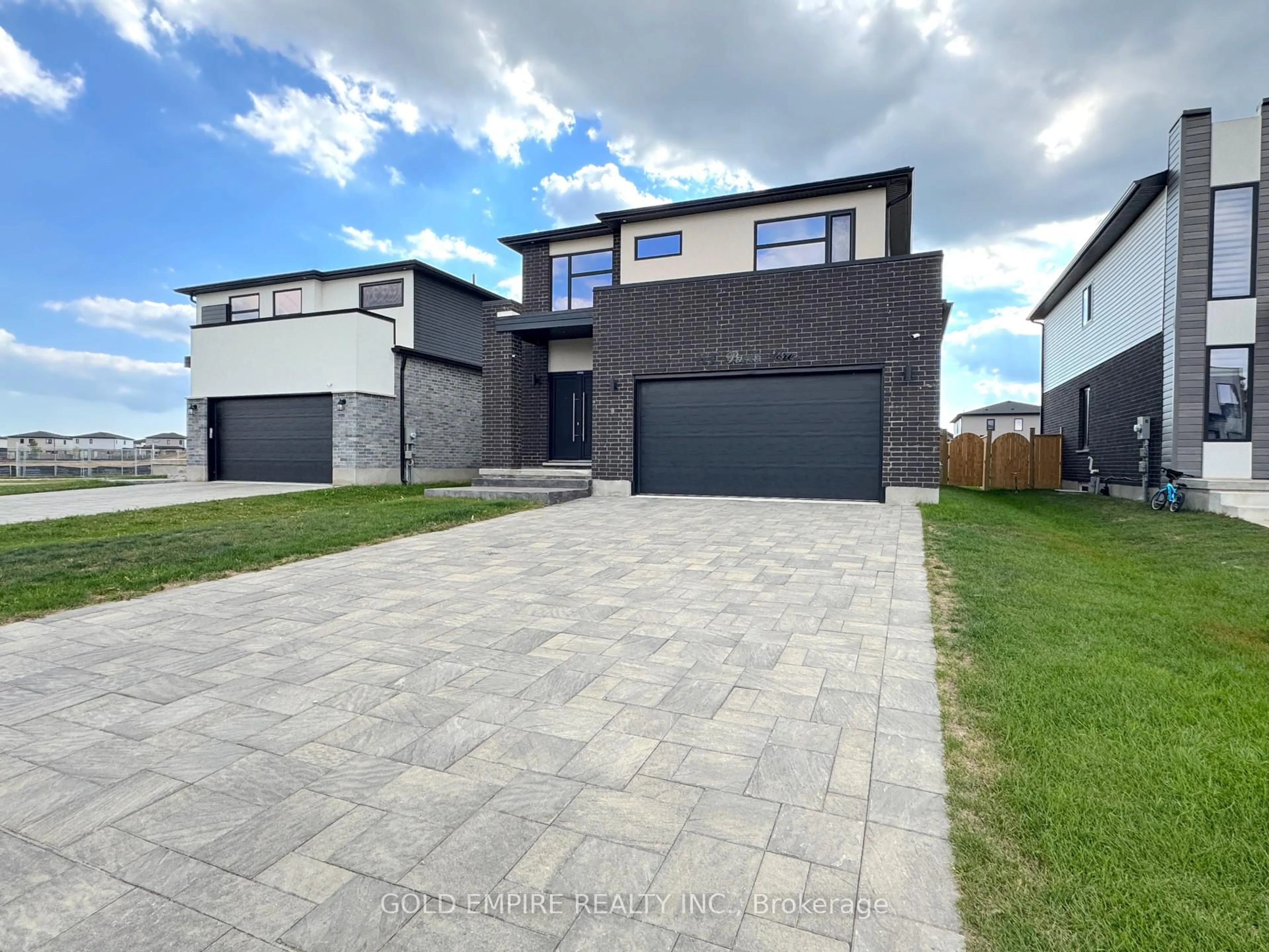 Home with brick exterior material, street for 61 Poole Cres, Middlesex Centre Ontario N0L 1R0