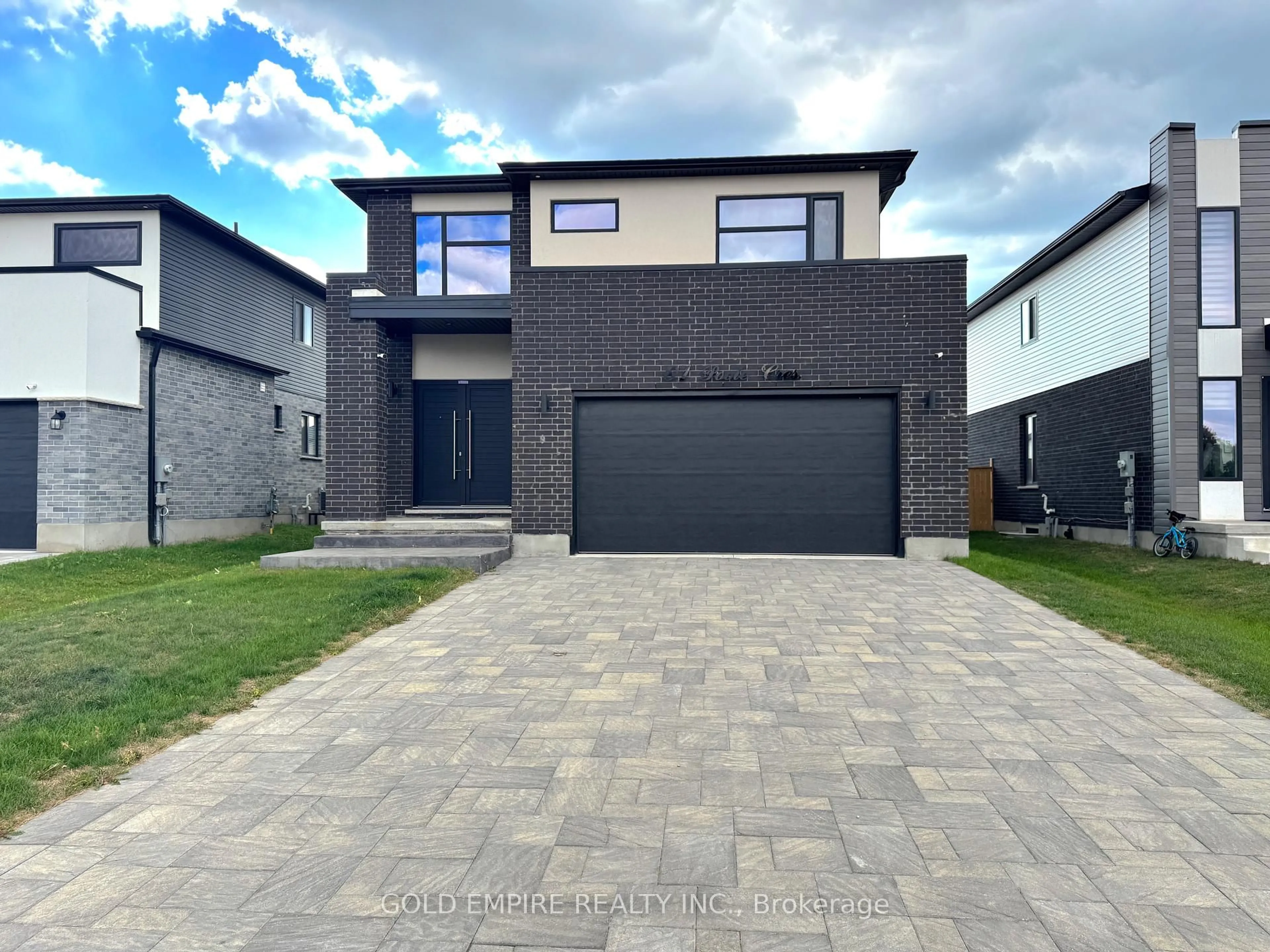 Home with brick exterior material, street for 61 Poole Cres, Middlesex Centre Ontario N0L 1R0
