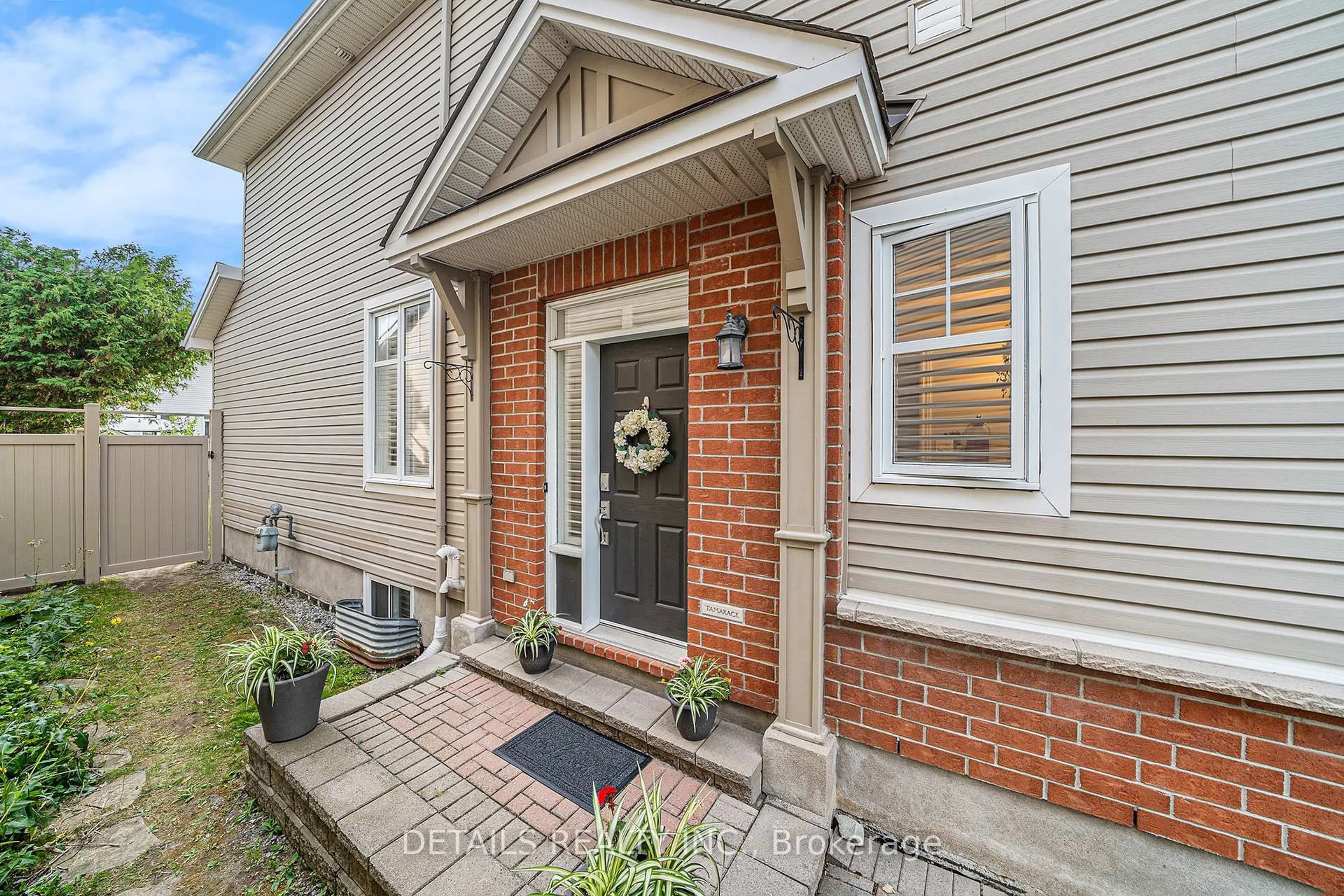 Home with brick exterior material, street for 84 Waterbridge Dr, Ottawa Ontario K2G 6T3